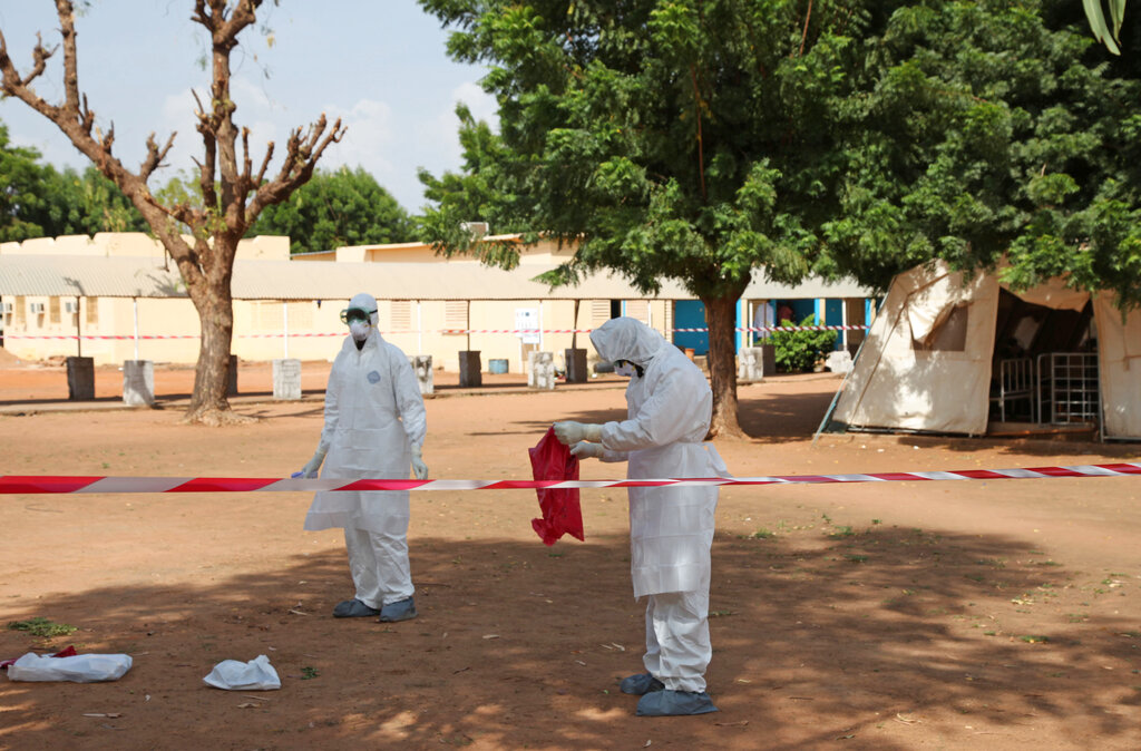 Health workers stand at a medical facility in Kayes, Mali