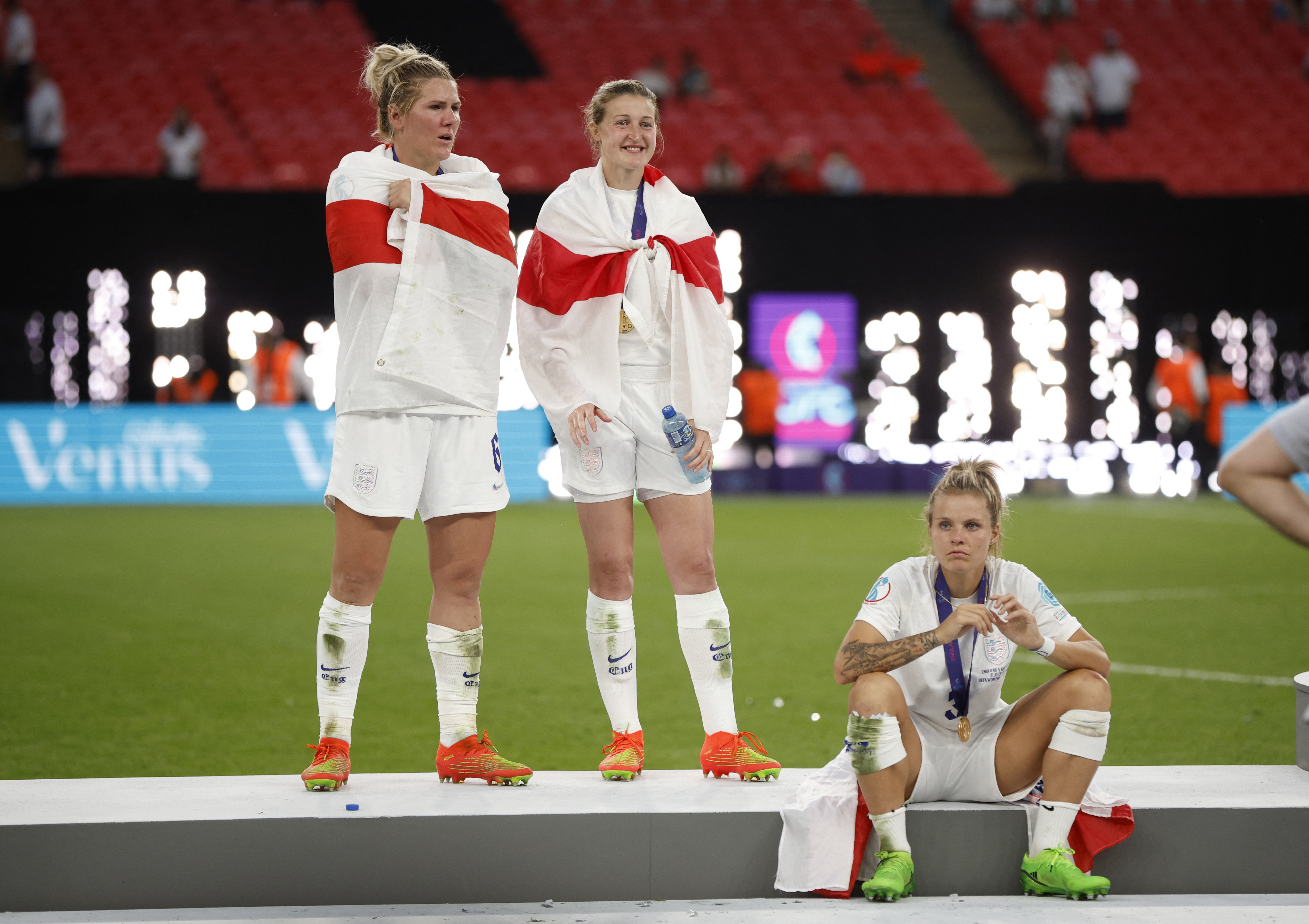 Soccer Football - Women's Euro 2022 - Final - England v Germany - Wembley Stadium, London, Britain - July 31, 2022 England's Millie Bright and Ellen White celebrate after winning Women's Euro 2022 REUTERS/John Sibley