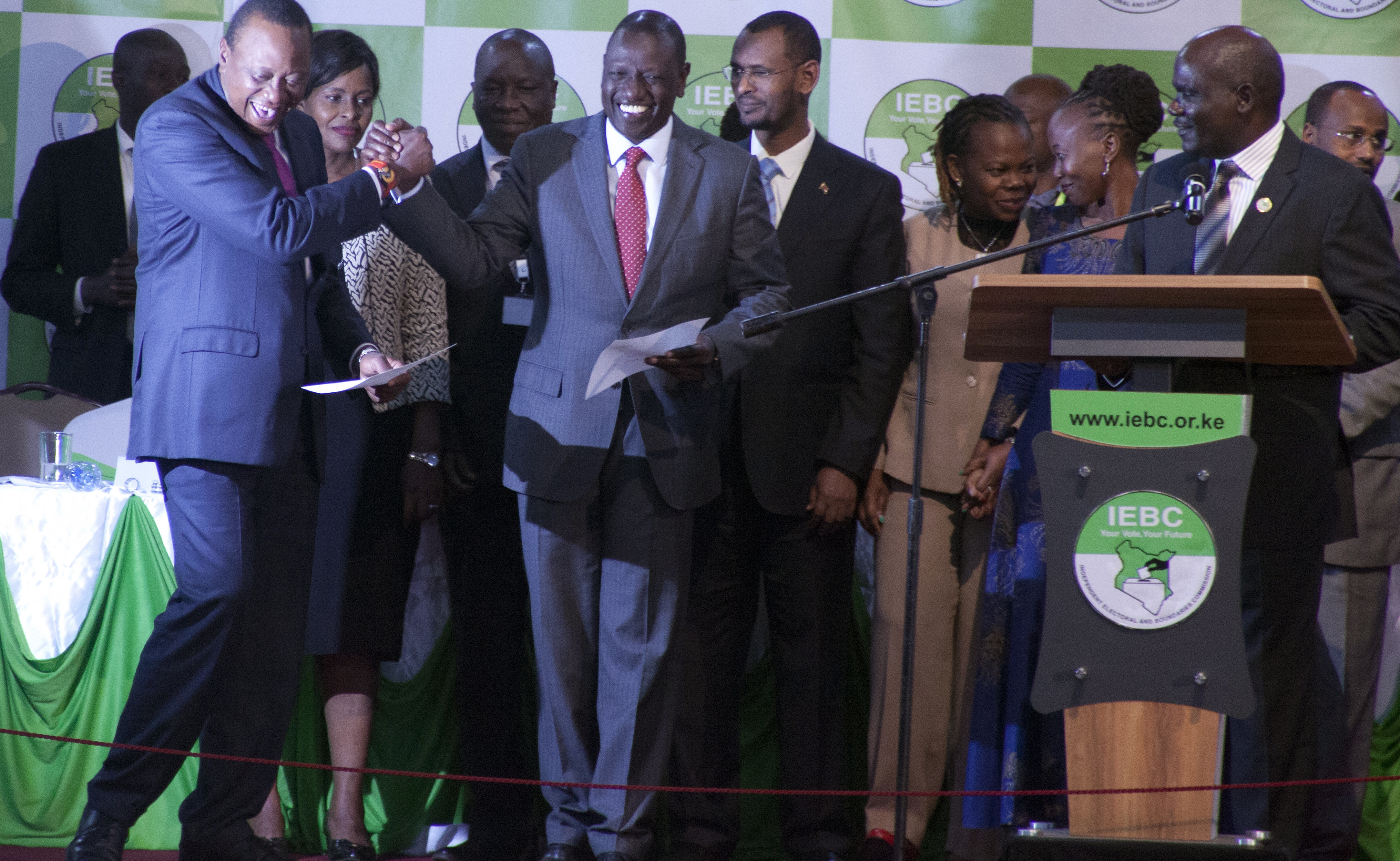 Kenyan President Uhuru Kenyatta left, and William Ruto his deputy