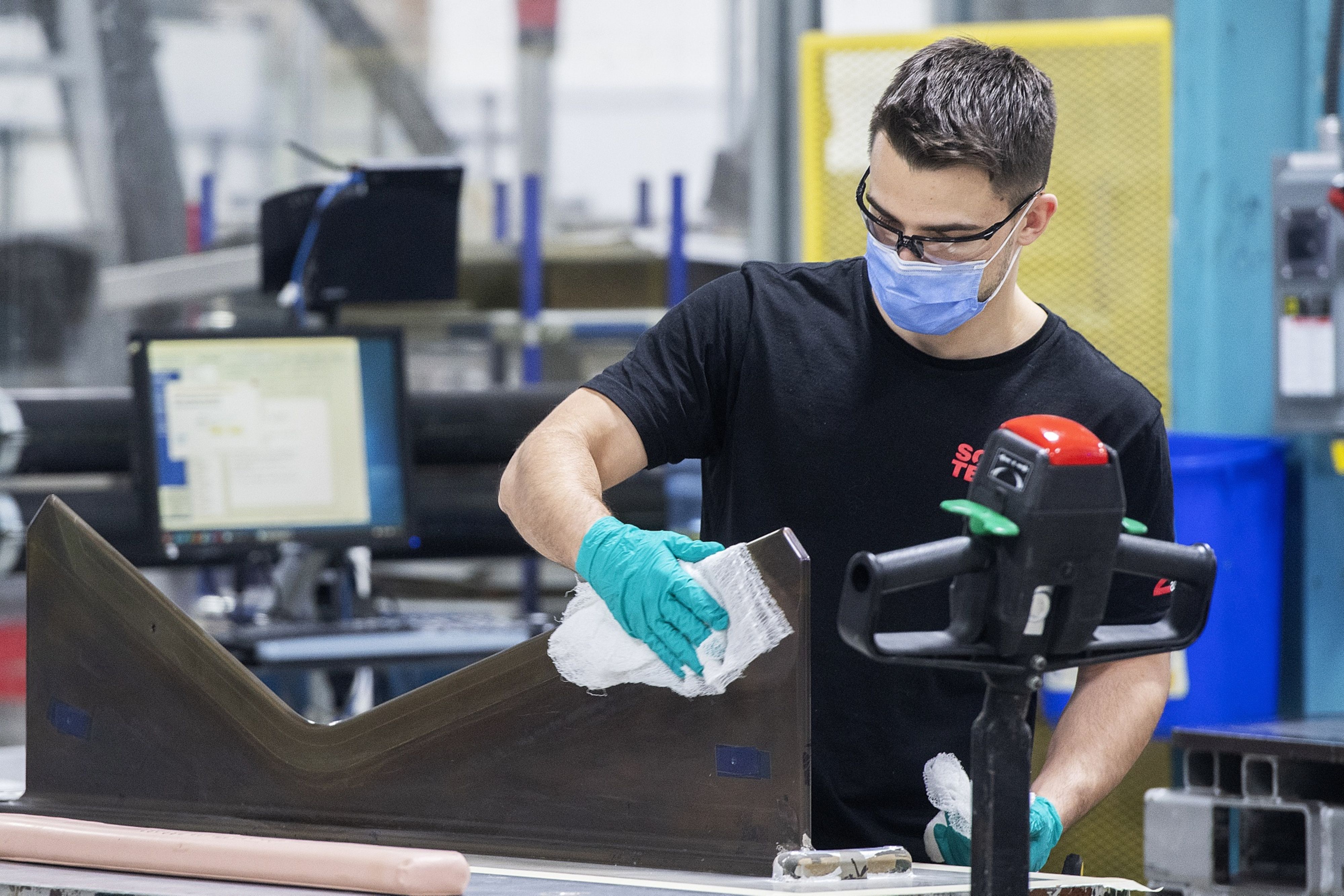 A worker at a Bell Helicopter Textron Canada manufacturing facility in Mirabel, Quebec, Canada