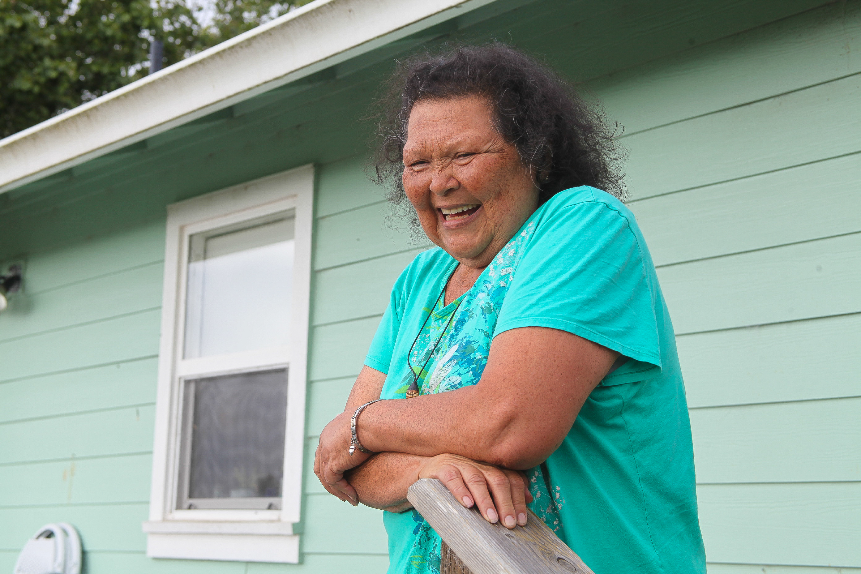 A photo of Cheryl Seidner laughing.
