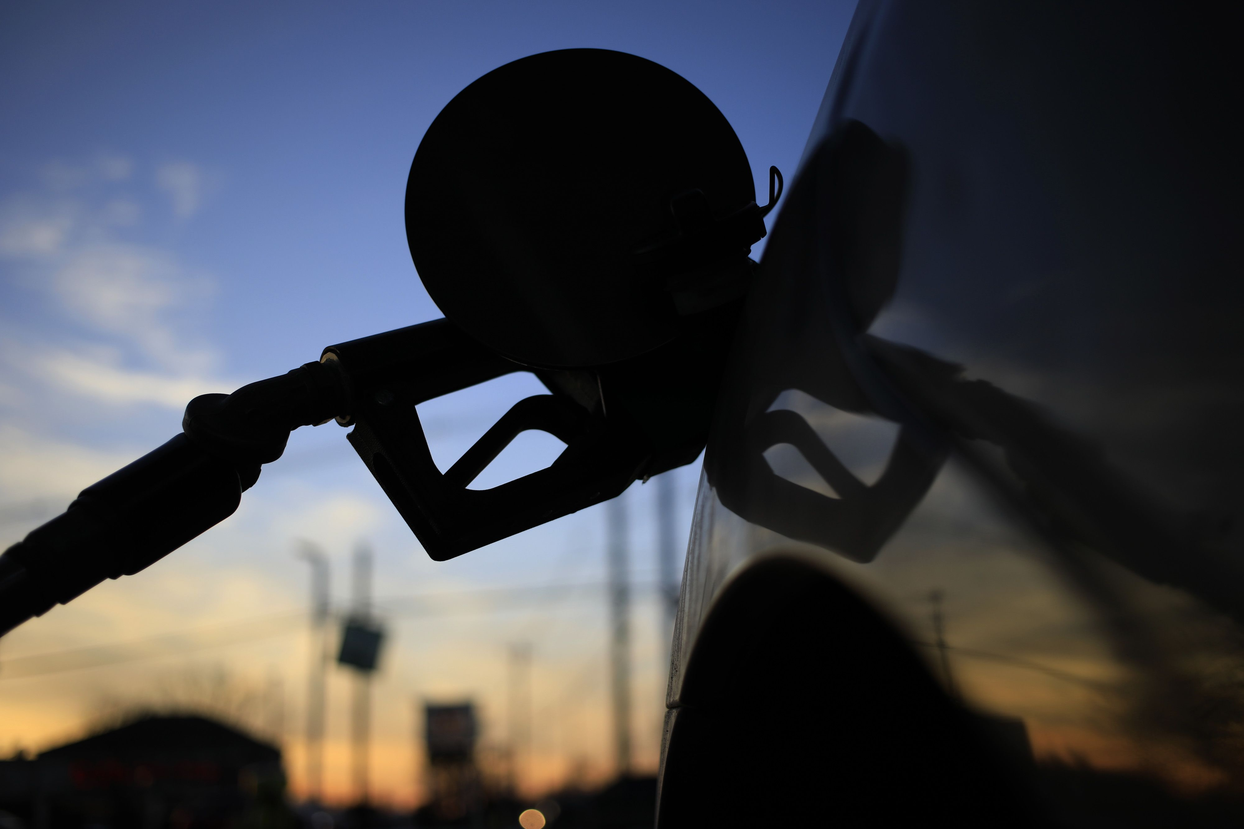 A fuel pump fills a car tank at a gas station in Louisville, Kentucky.