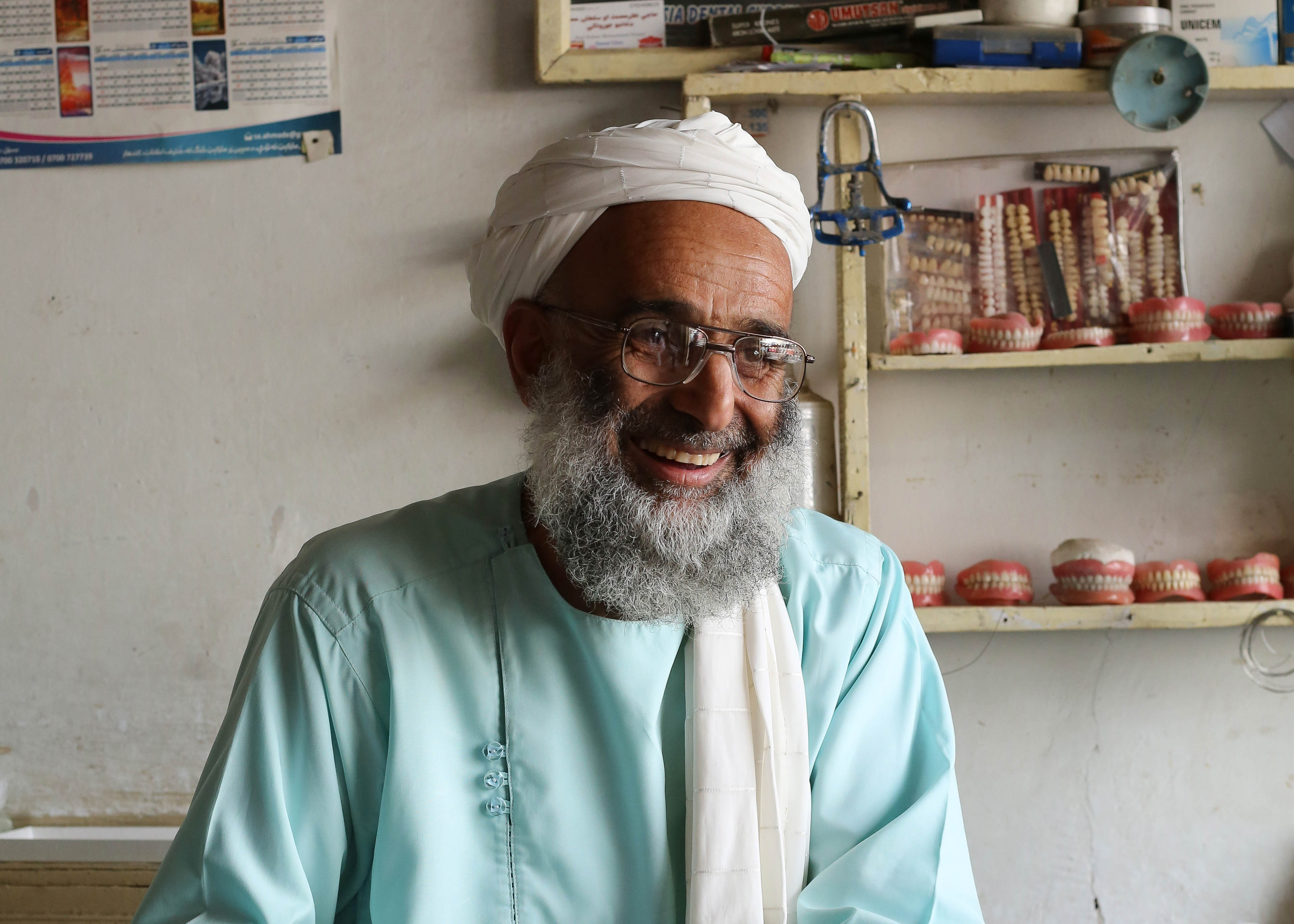 A photo of Haji Muhammad Sultan sitting.