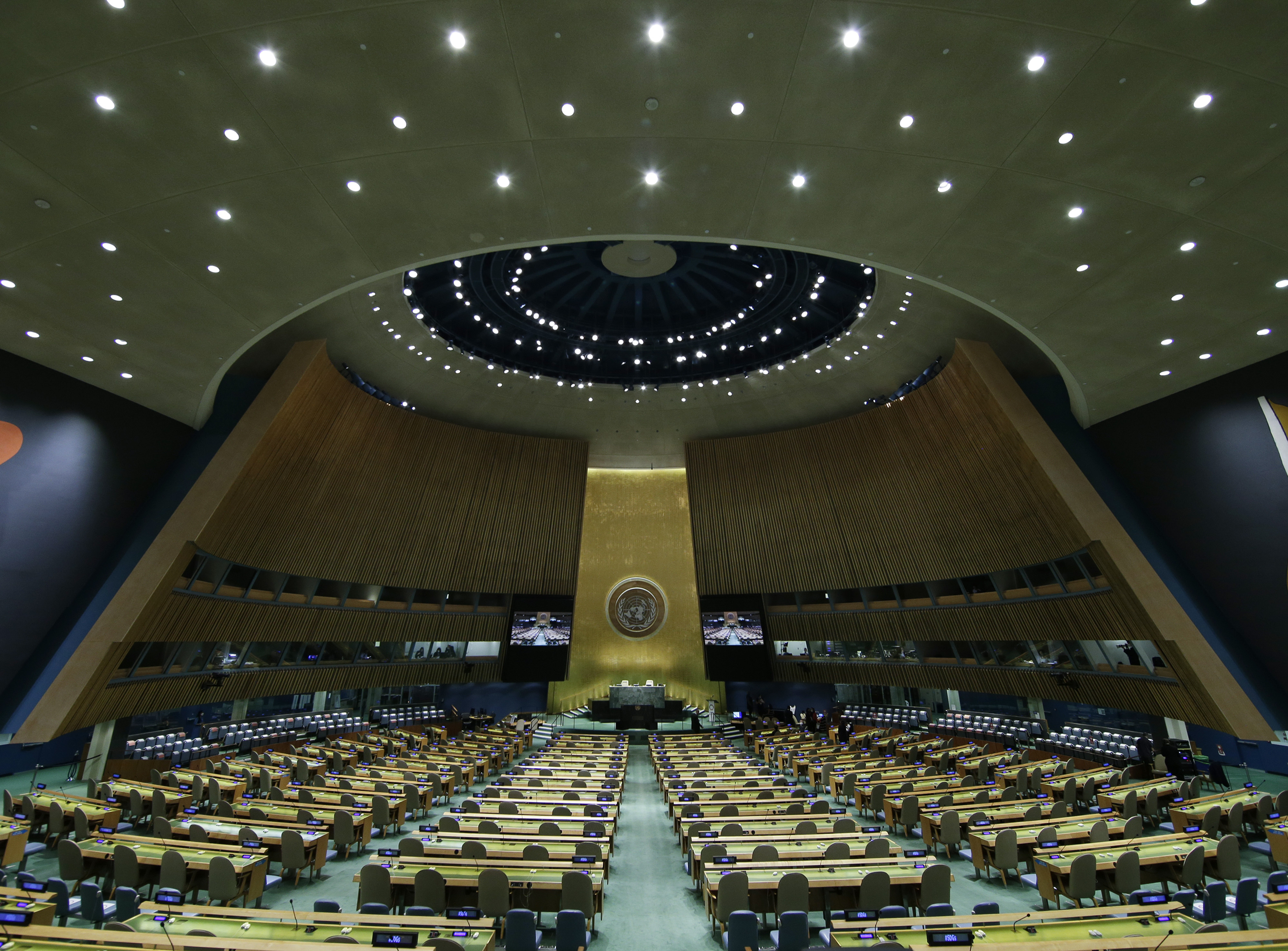 The United Nations General Assembly Hall sits empty before the start of the 76th Session of the General Assembly at U.N. headquarters, Monday, Sept. 20, 2021, in New York. (John Angelillo/Pool via AP)