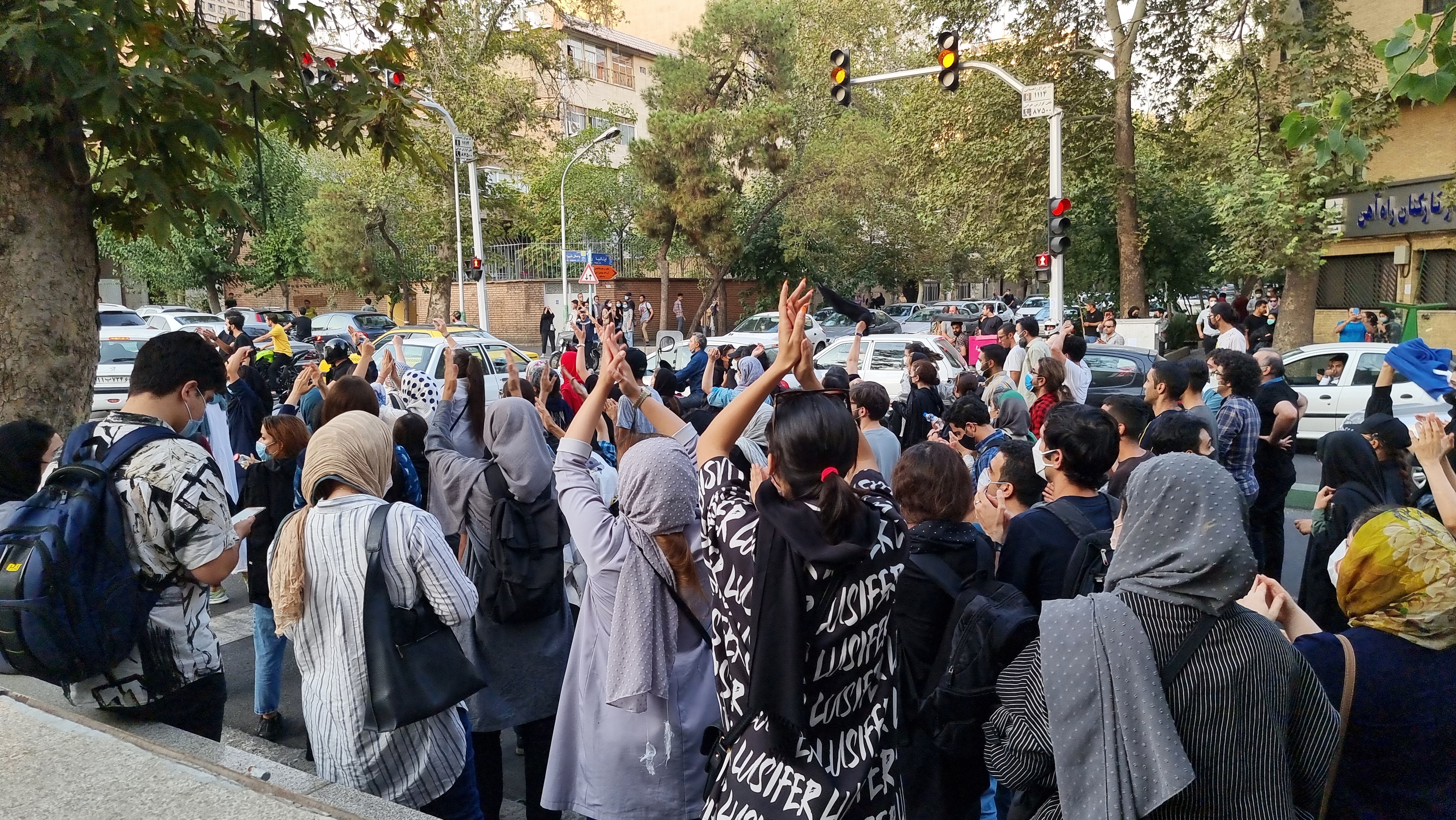 People gather in protest against the death of Mahsa Amini along the streets on September 19, 2022 in Tehran, Iran.