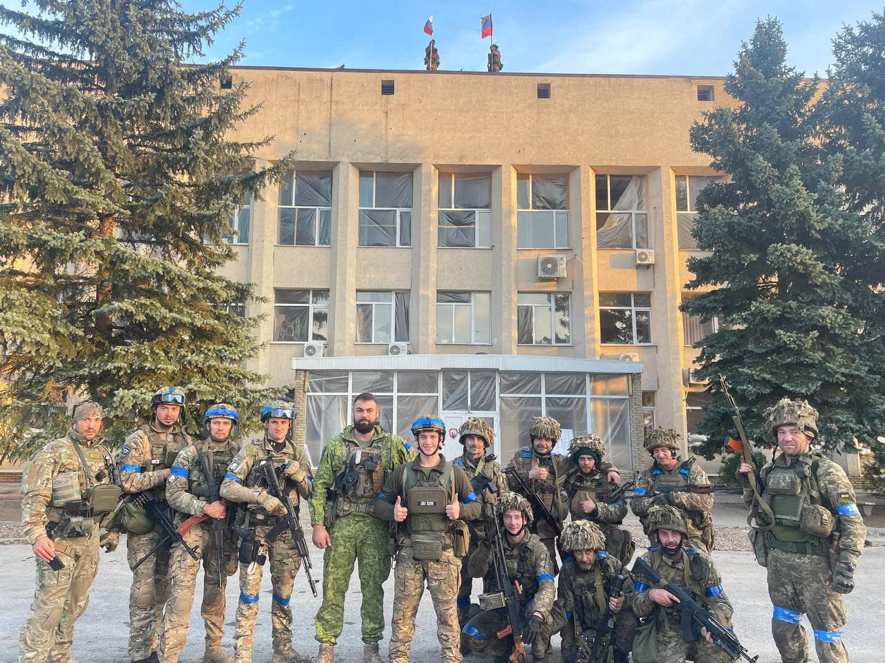 Ukrainian troops pose for a photo in Lyman, Ukraine