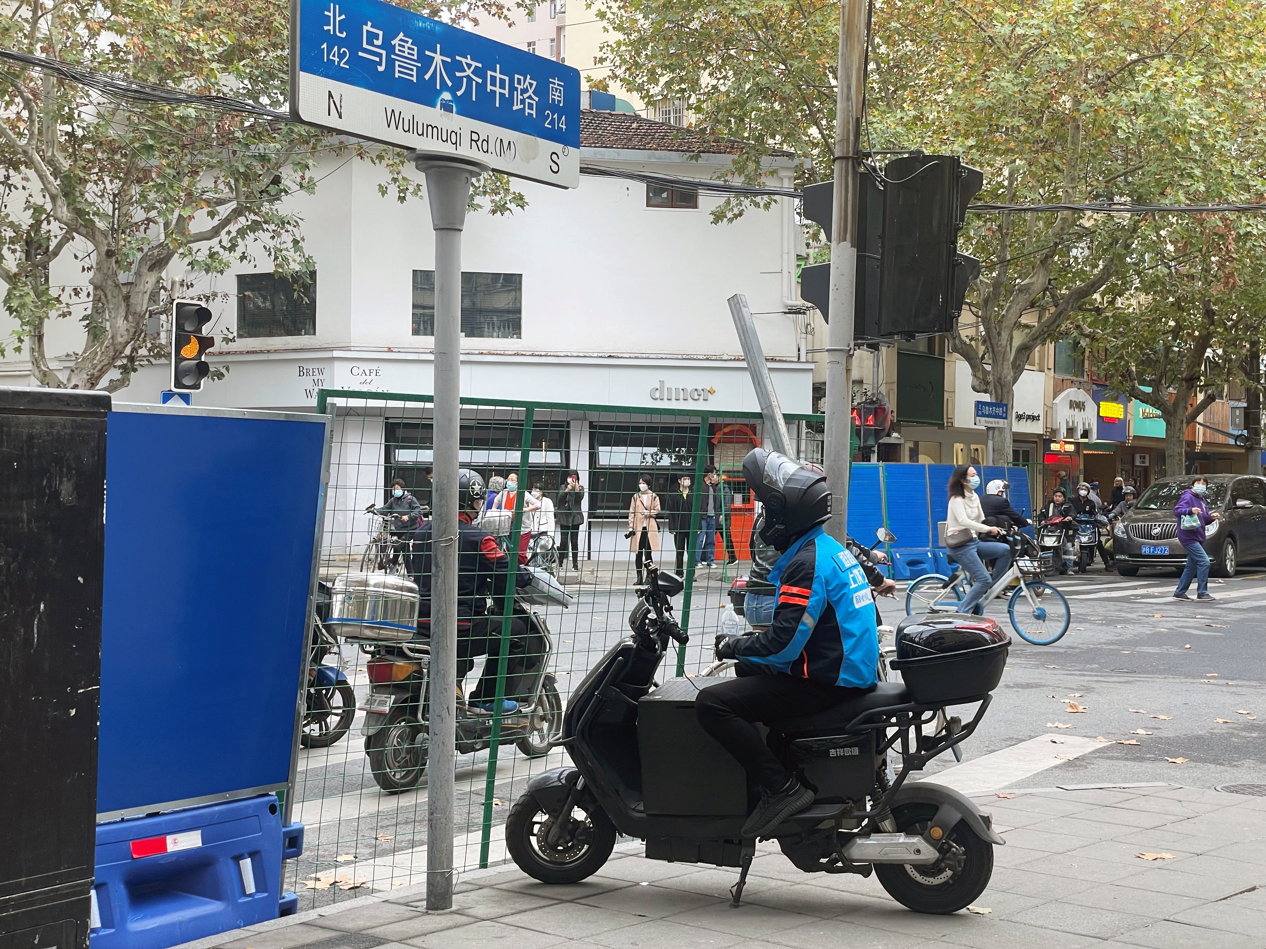 Barriers along the street in Shanghai where protesters and police clashed