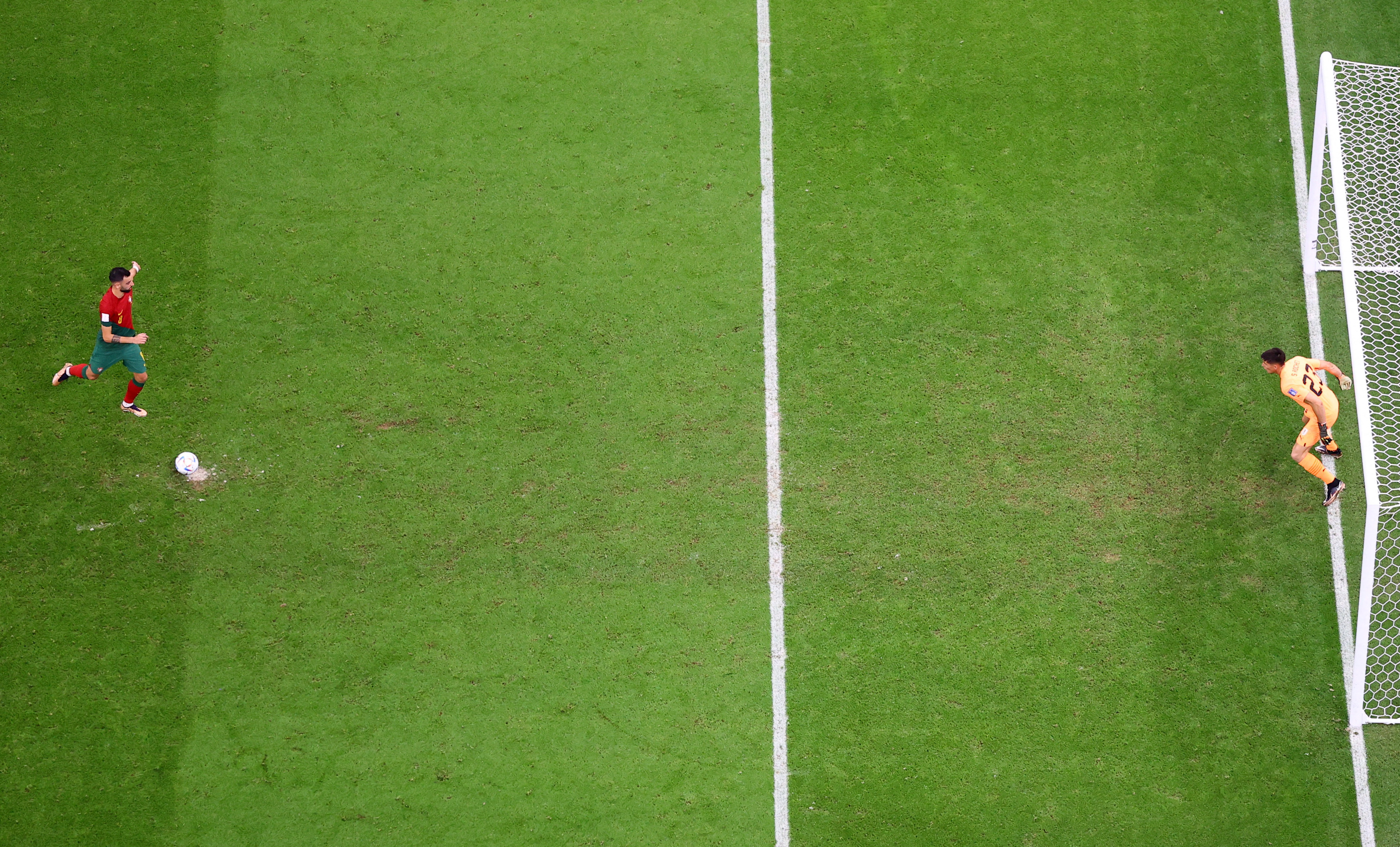 Portugal's Bruno Fernandes scores their second goal from the penalty spot.