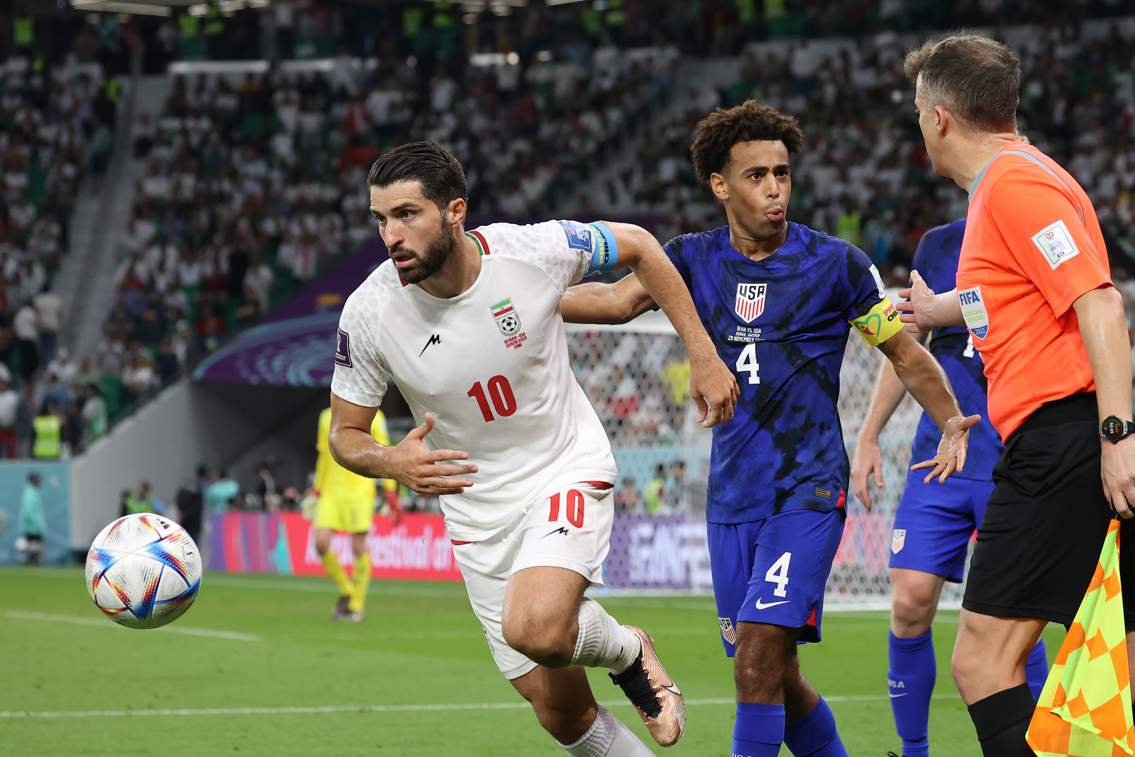 Tyler Adams #4 remonstrates with the officia