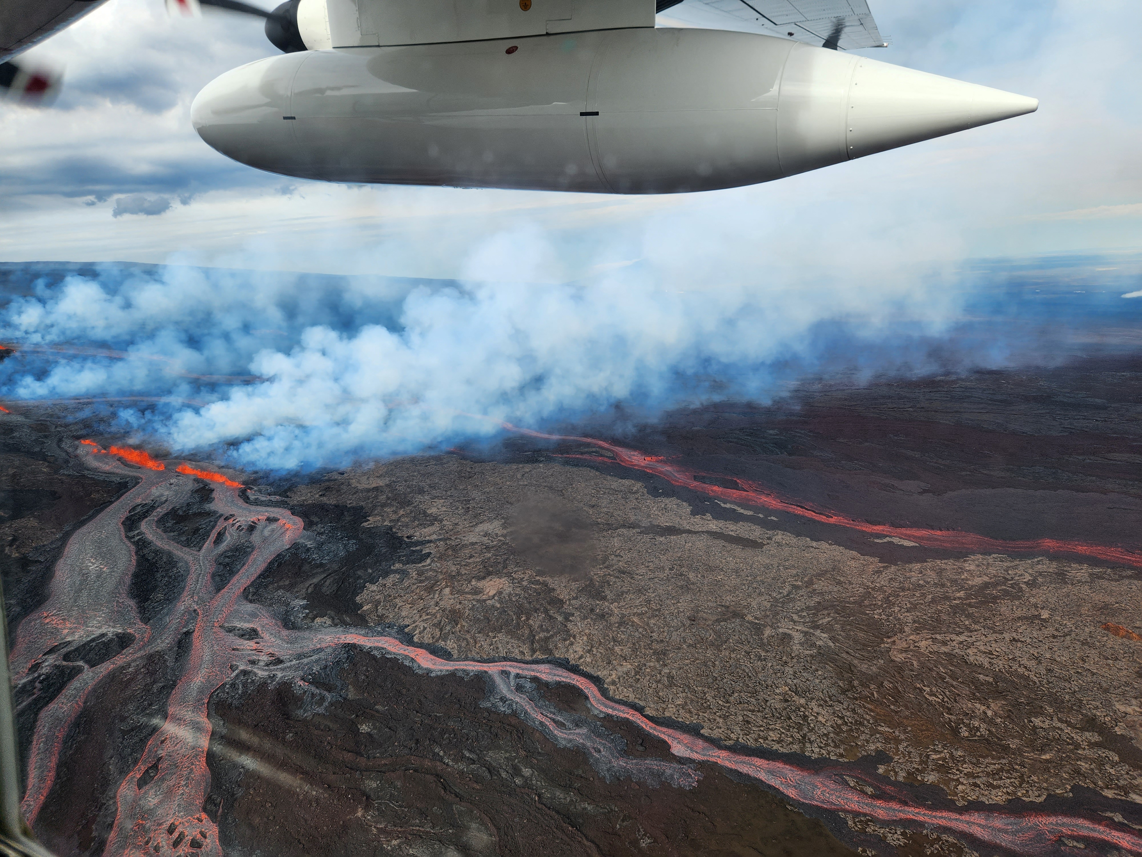 A fissure and lava flows on the Northeast Rift Zone