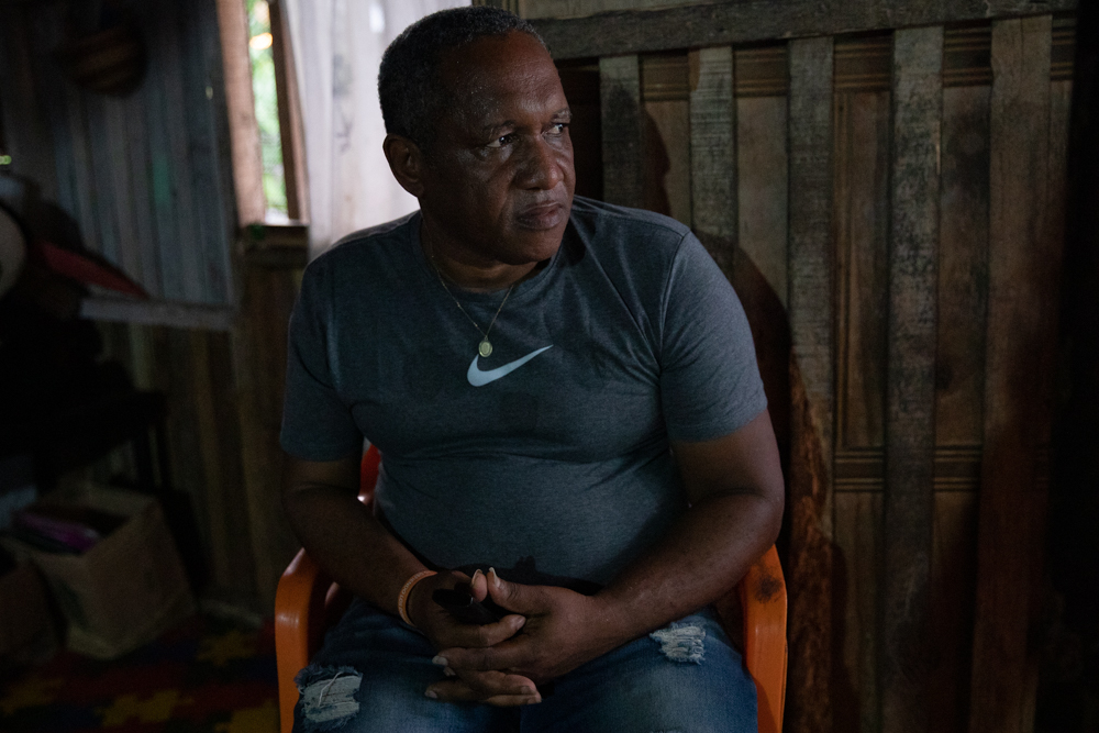 Jorge Ocoró seated indoors