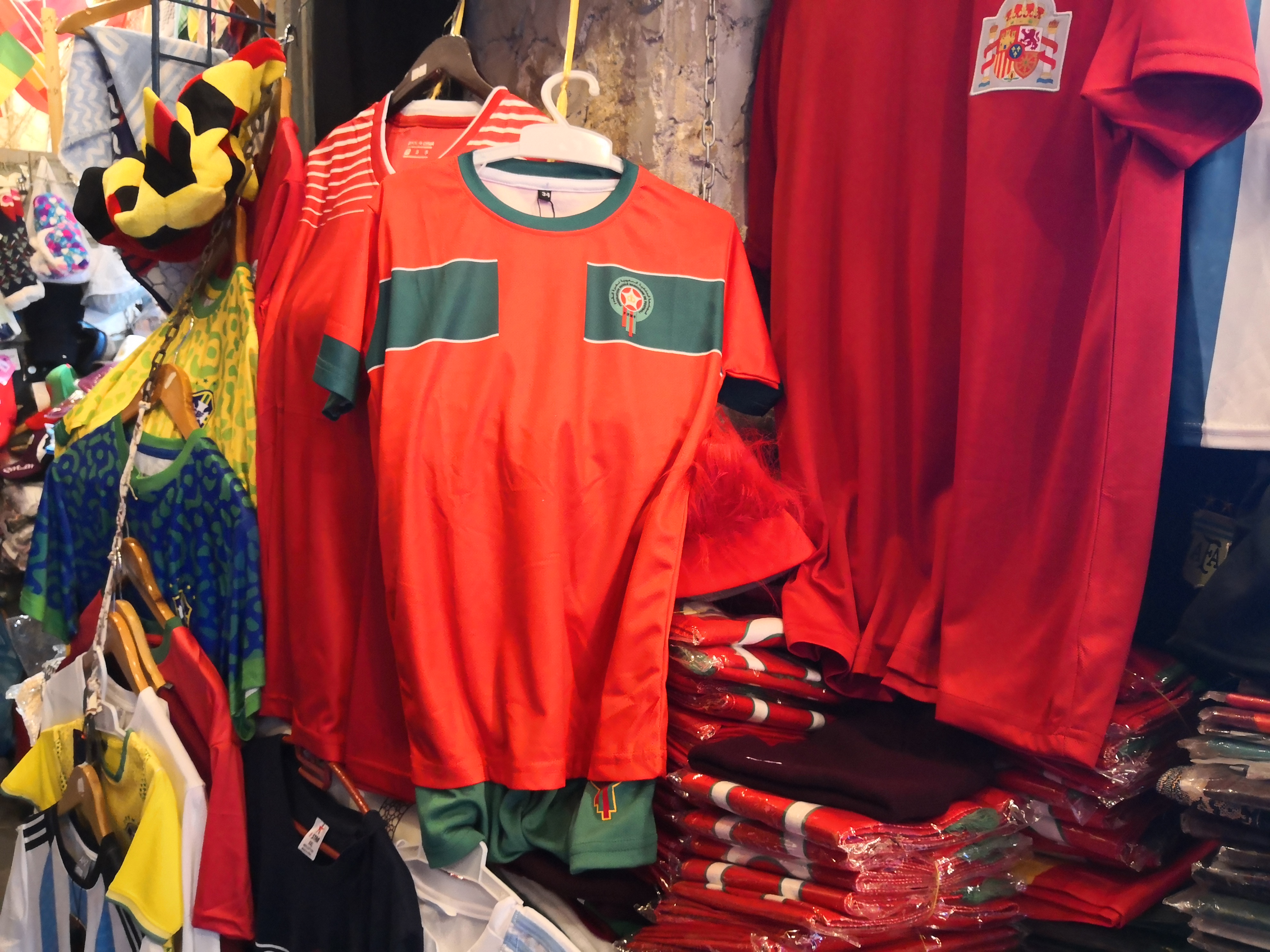 A Moroccan national team replica shirt hangs in a shop in Souq Waqif, Doha, Qatar