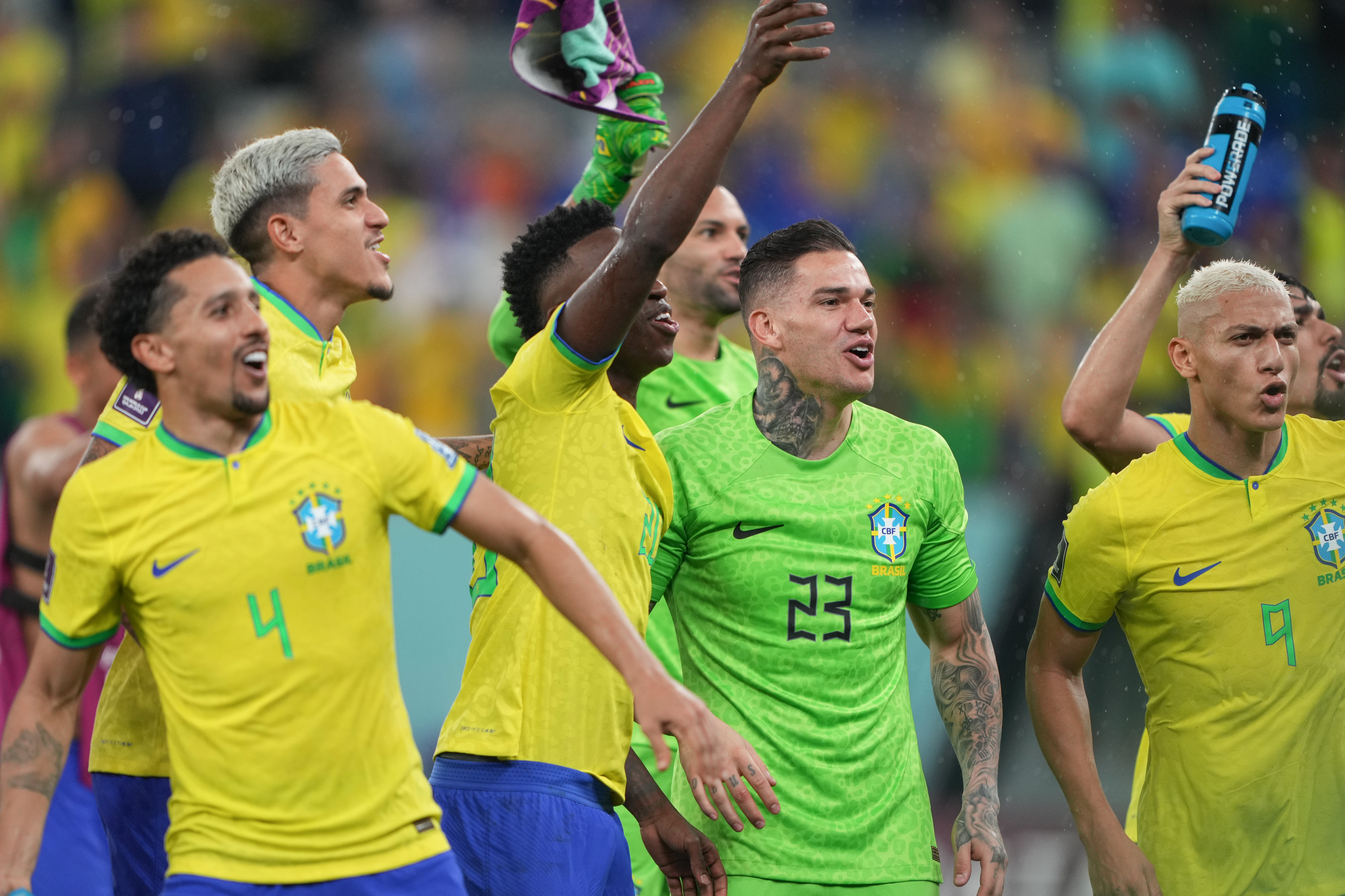 Brazil players celebrating their 4-1 victory over South Korea