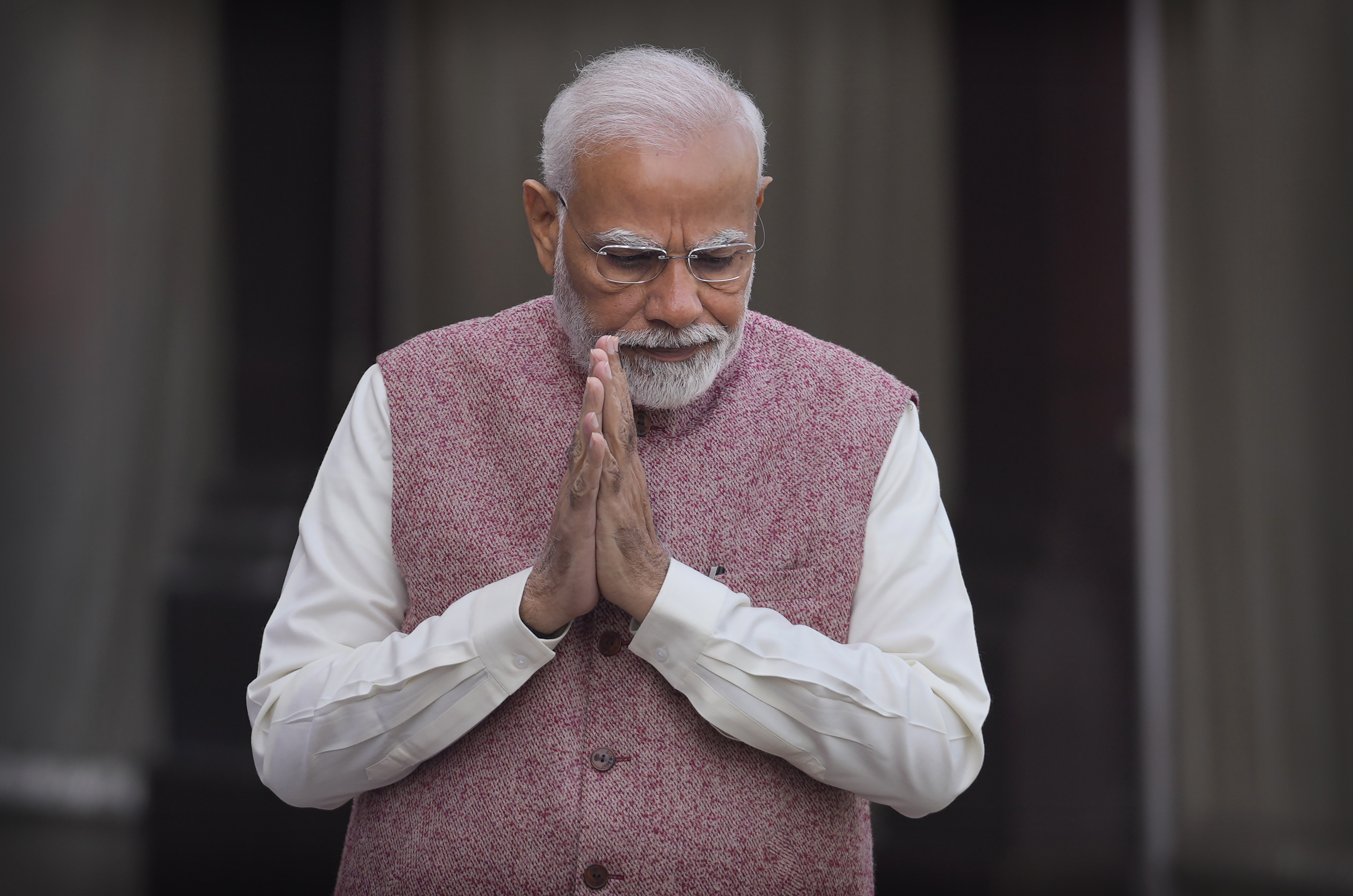 Narendra Modi greets his cabinet colleagues.