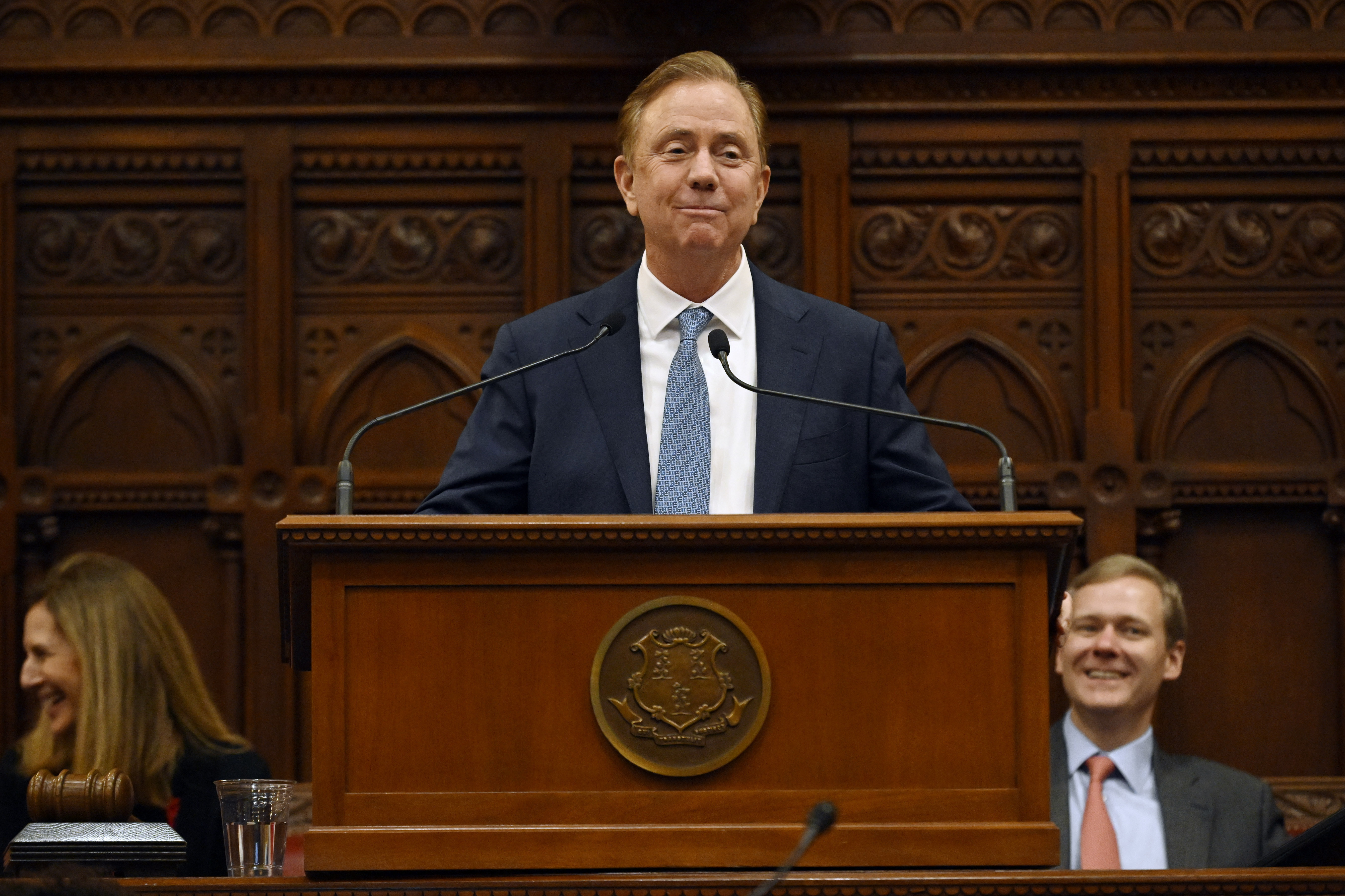 Ned Lamont at a lectern at the Connecticut State Capitol.