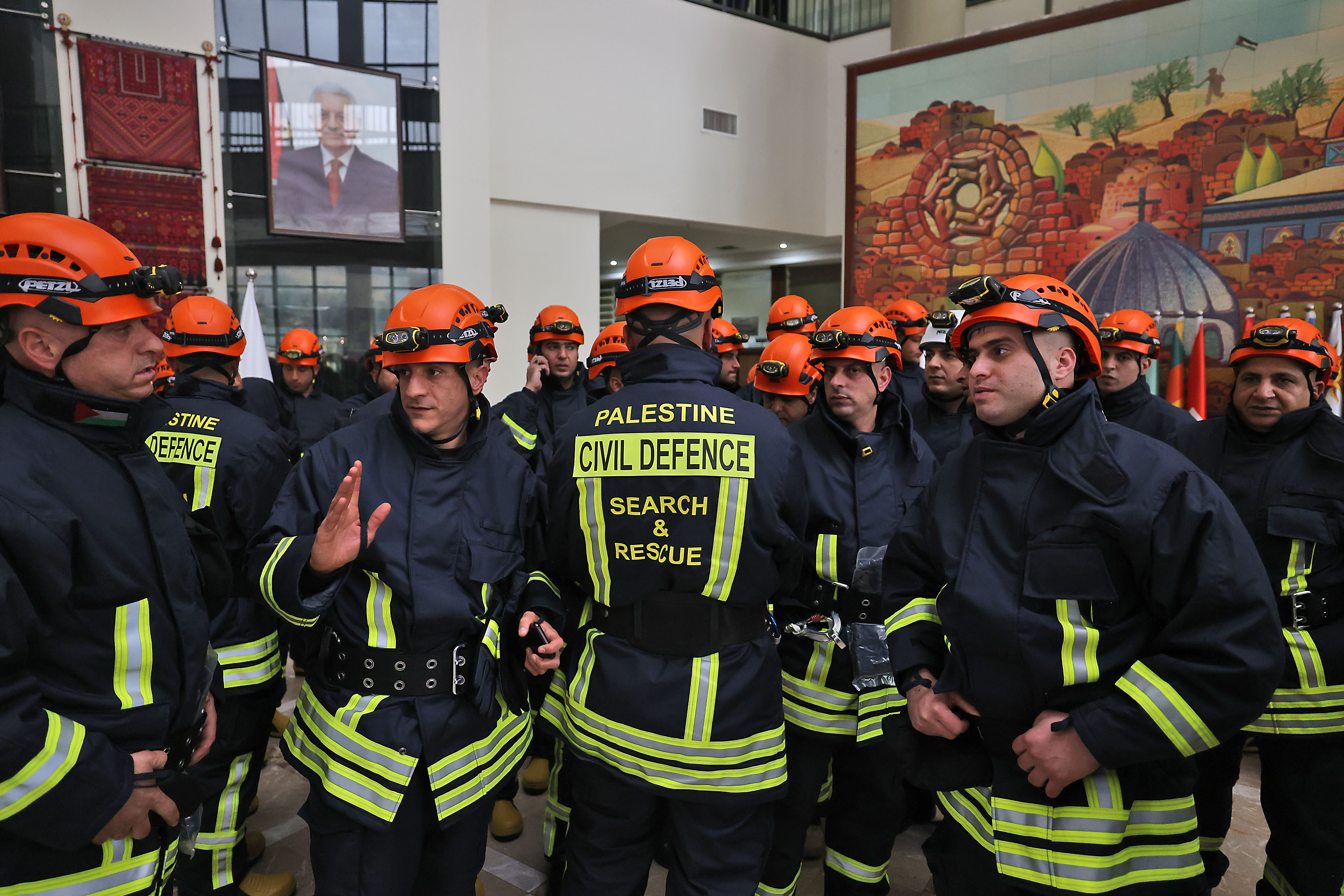 A Palestinian relief team gathers before their departure to Syria and Turkey following a deadly earthquake