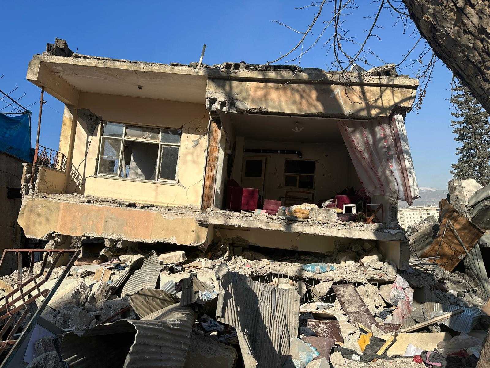 A collapsed building in Kahramanmaras, Turkey, on Tuesday, February 14, 2023 [Stefanie Dekker/Al Jazeera]