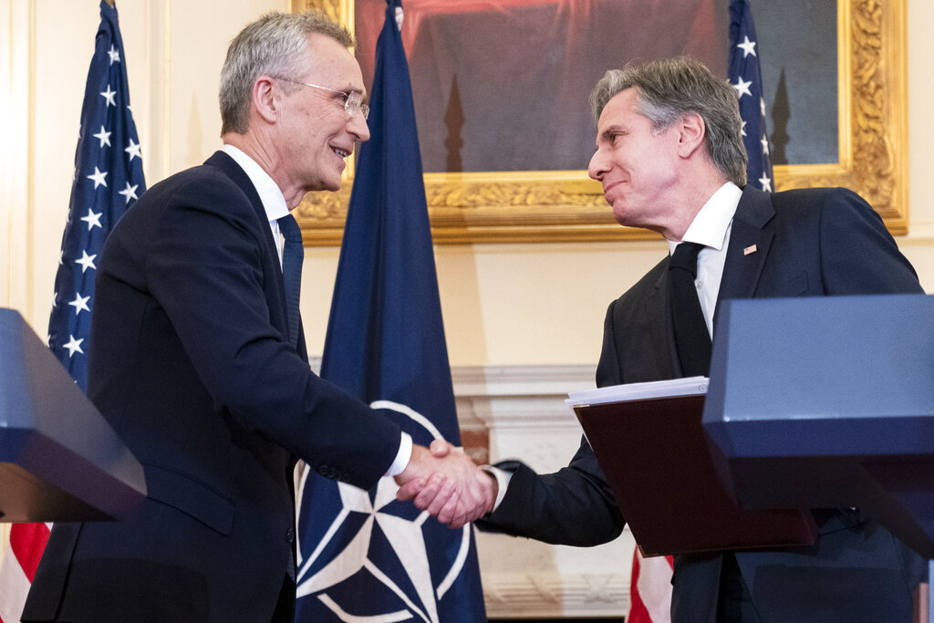 Stoltenberg and Blinken shake hands on Wednesday