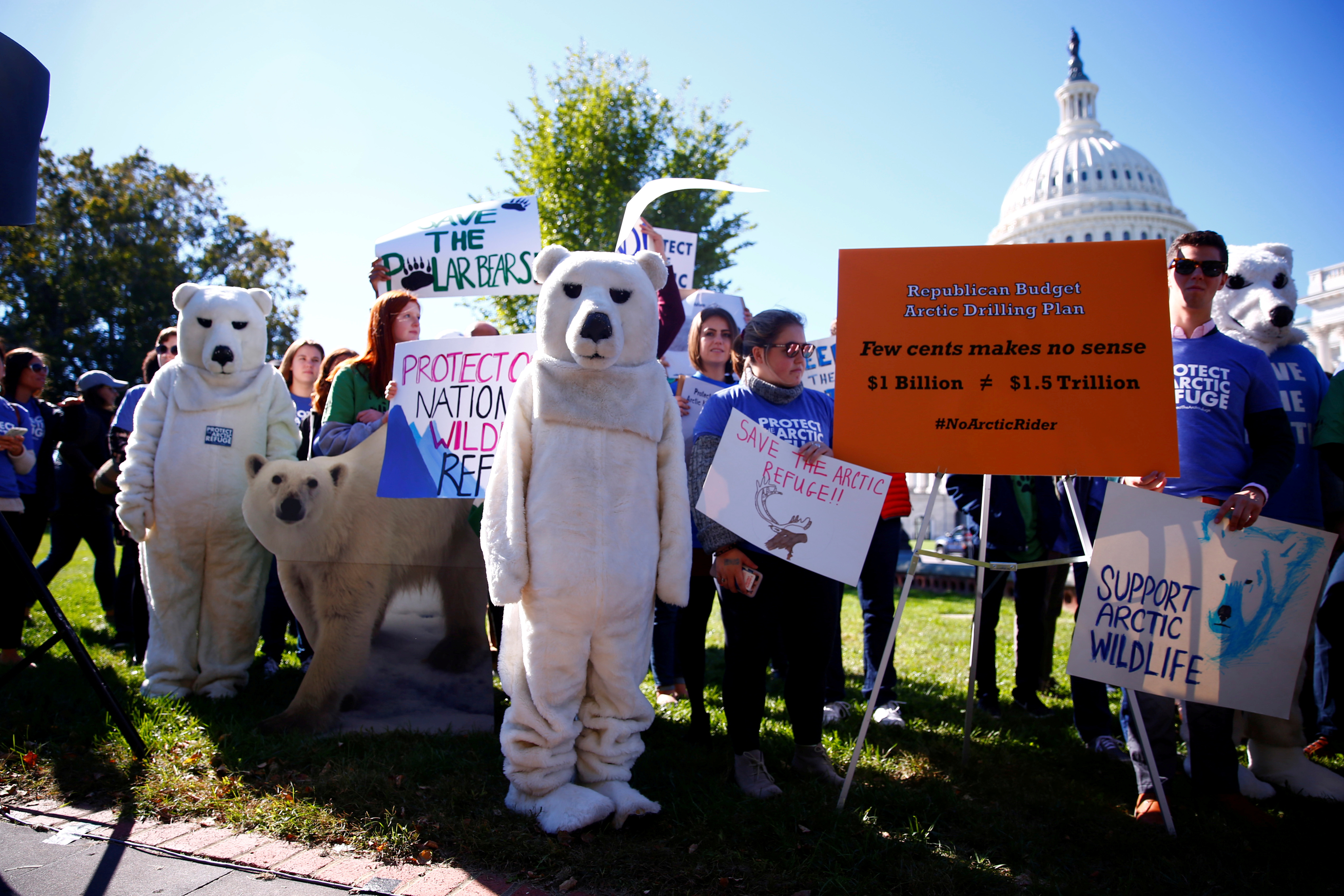 Activists attend a protest against the legislation that would open Wilderness in Alaska to oil drilling on Capitol Hill