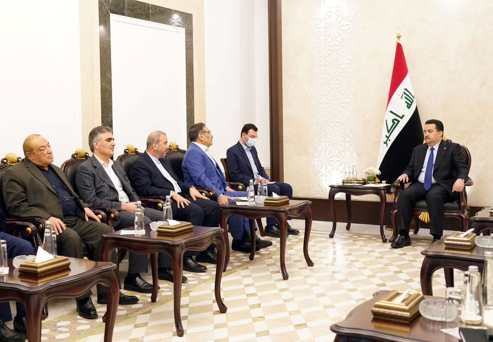 Iraqi Prime Minister Mohammed Shia al-Sudani meets with Iran's Supreme National Security Council secretary Ali Shamkhani, in Baghdad, Iraq, March 19, 2023. Iraqi Prime Minister Media Office/Handout via REUTERS ATTENTION EDITORS - THIS IMAGE WAS PROVIDED BY A THIRD PARTY.