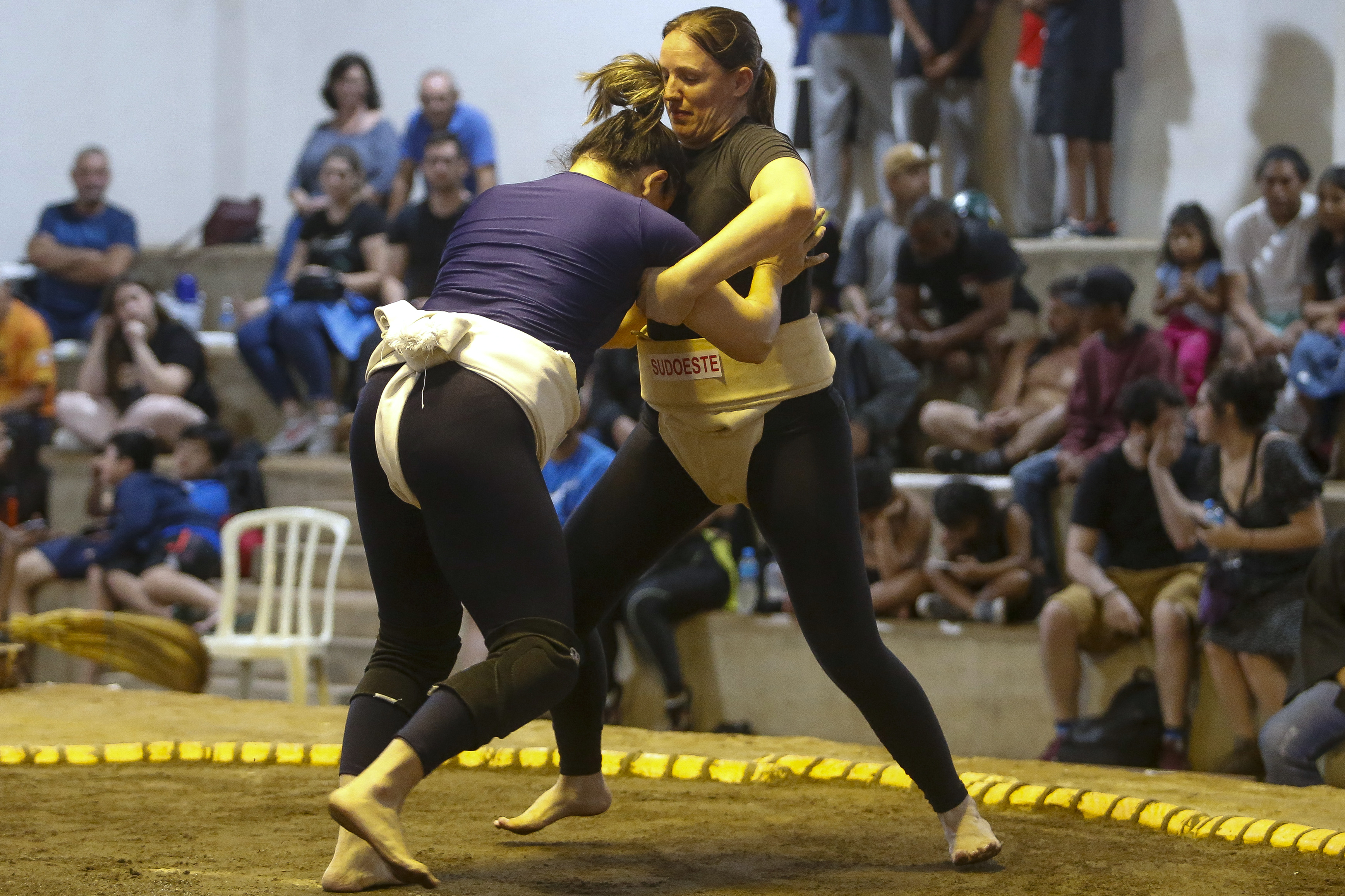 Sumo wrestlers fight during a Brazilian sumo championship bout, a qualifier for the South American championship, in Sao Paulo, Brazil