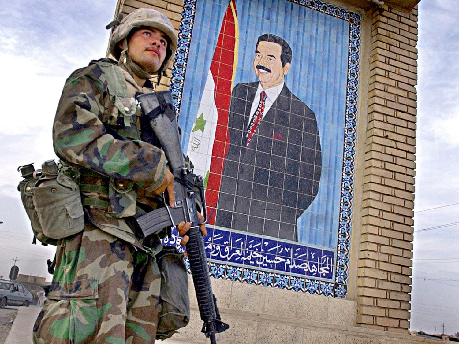 US Marine in front of Saddam Hussein tile poster