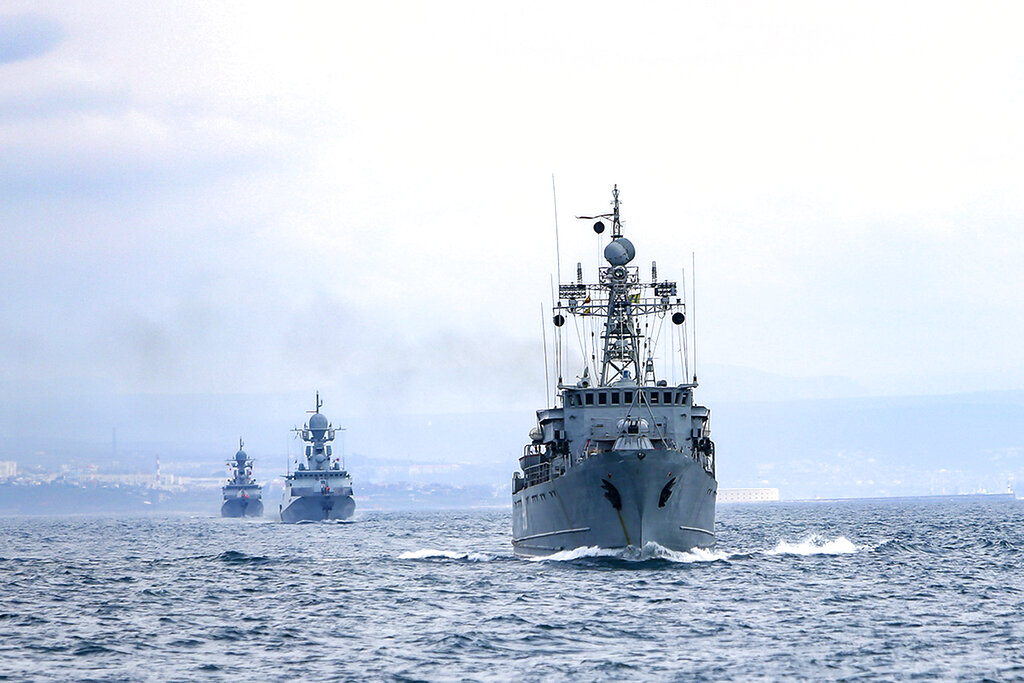 his handout photo released on Wednesday, April 14, 2021 by Russian Defense Ministry Press Service shows, Russian navy ships are seen during navy drills in the Black Sea. Russia has insisted that it has the right to close areas of the Black Sea for foreign naval ships and rejected Ukrainian and Western criticism of the move. (Russian Defense Ministry Press Service via AP)
