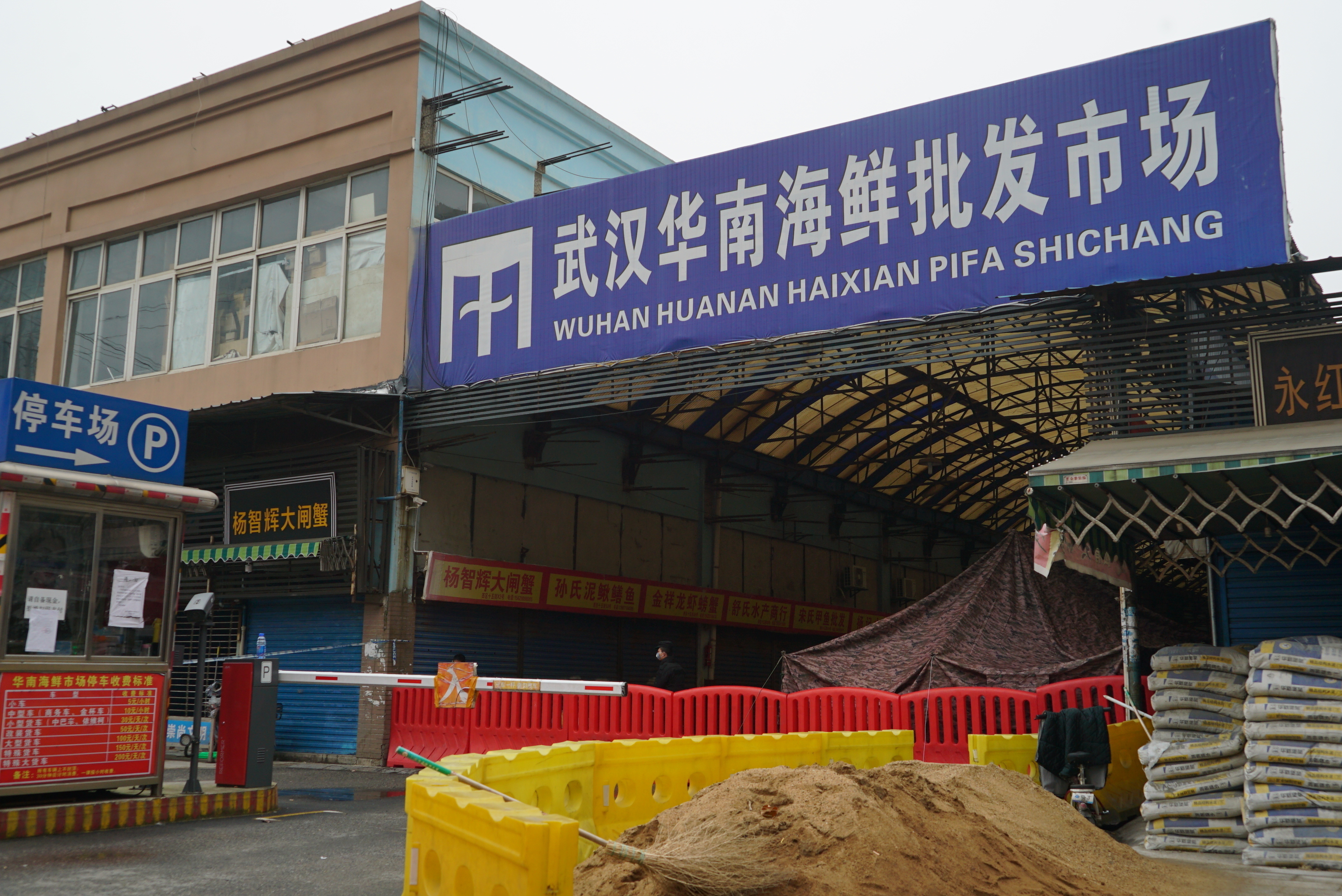 FILE - The Huanan Seafood Wholesale Market, sits closed in Wuhan in central China's Hubei province on Jan. 21, 2020. Nearly two years into the COVID-19 pandemic, the origin of the virus tormenting the world remains shrouded in mystery. Some scientists believe it started at the market.