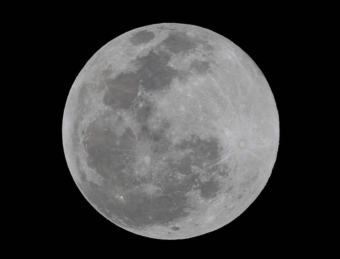 A full moon is seen over Mexico City