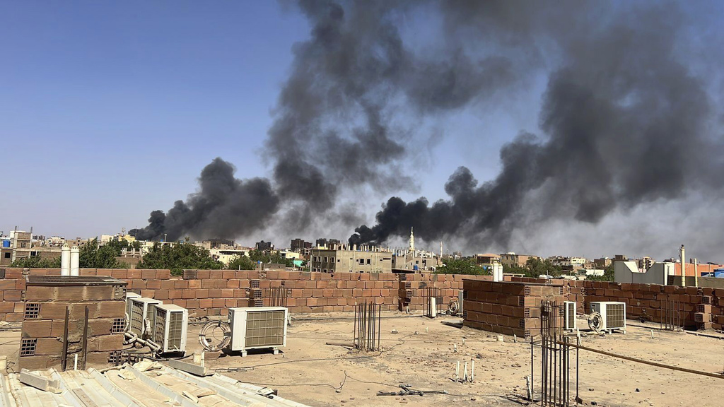 Smoke fills the sky in Khartoum, Sudan, near Doha International Hospital on Friday