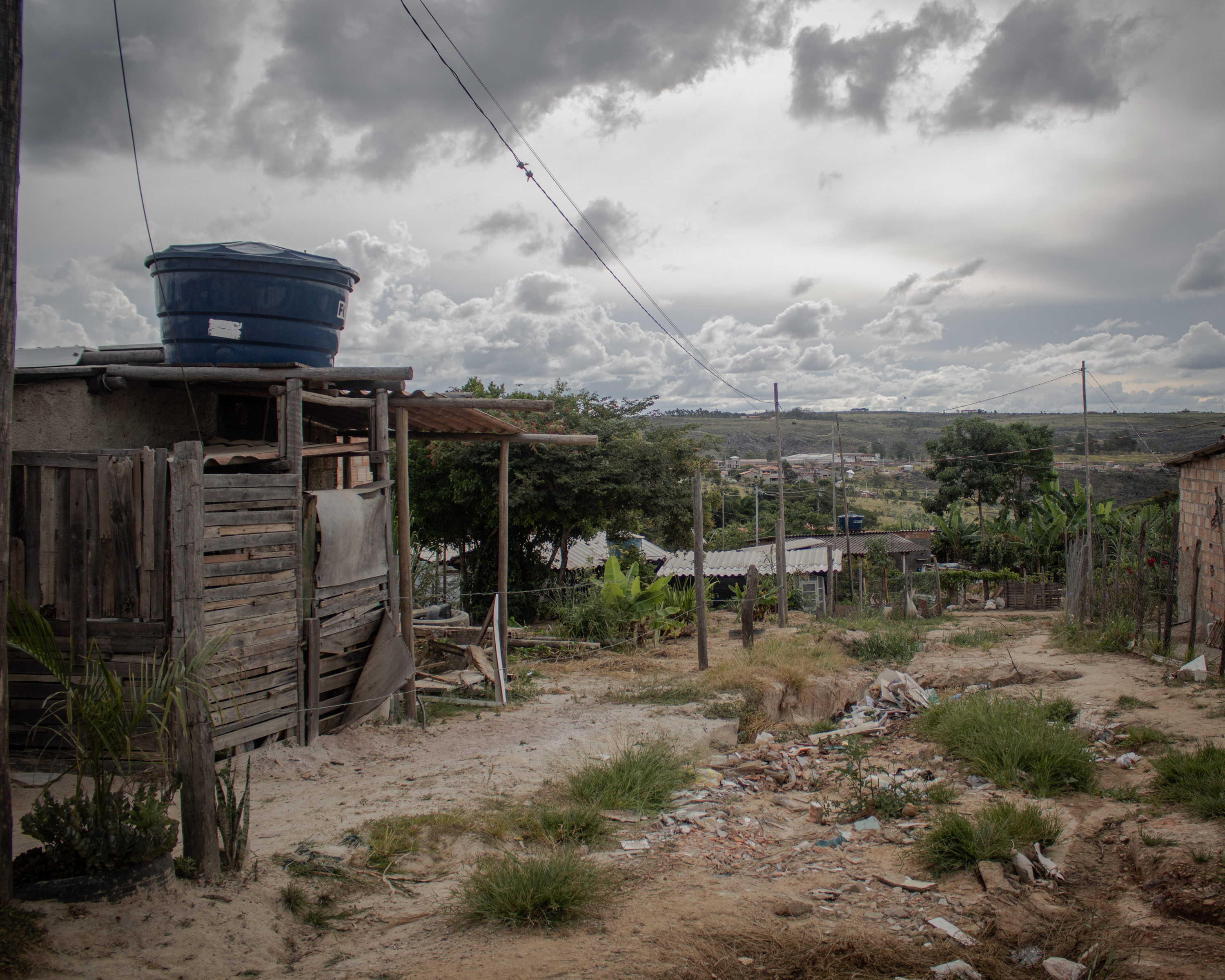 A photo of Ocupação Vitória with houses and greenery.