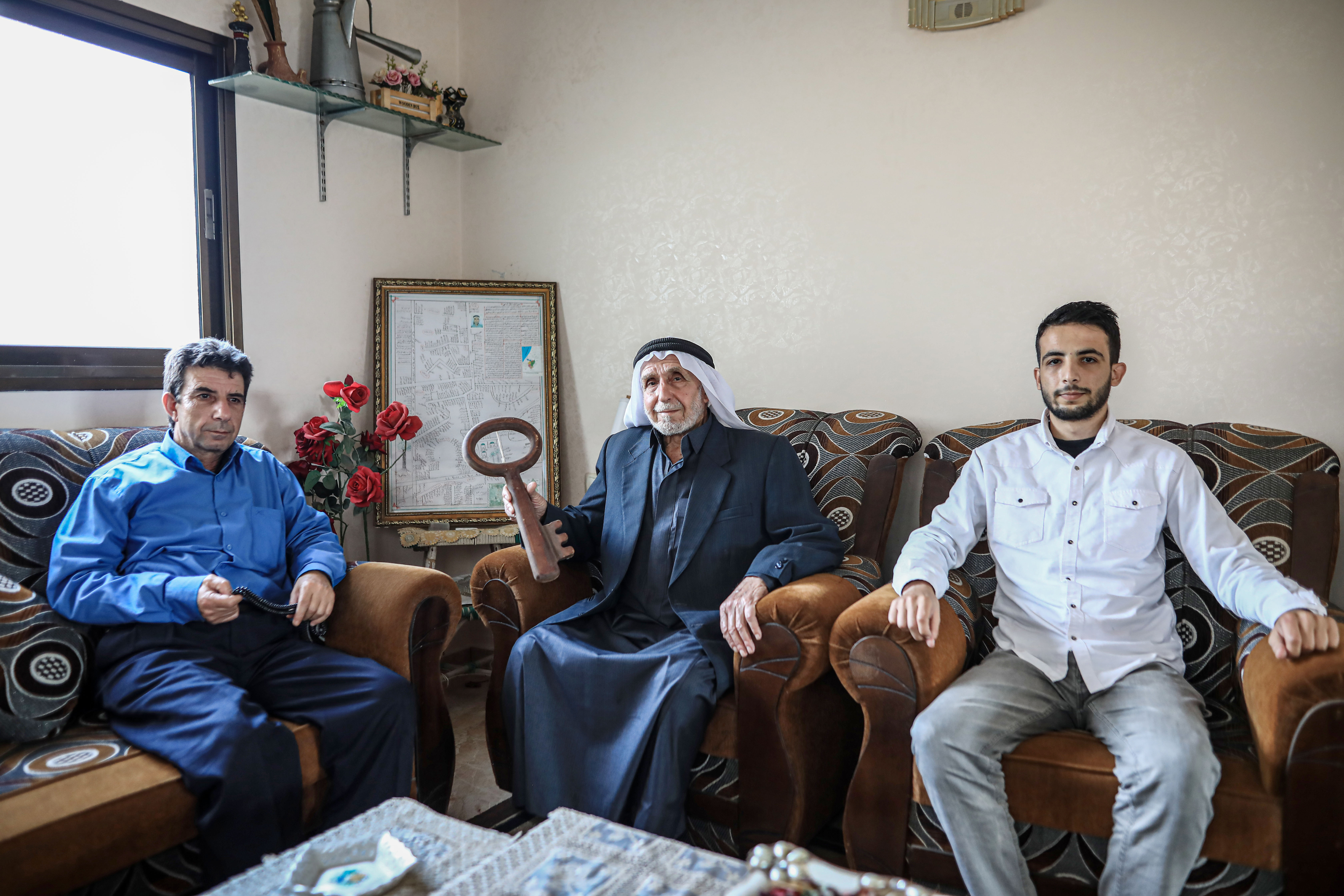 A grandfather, his son and his grandson 