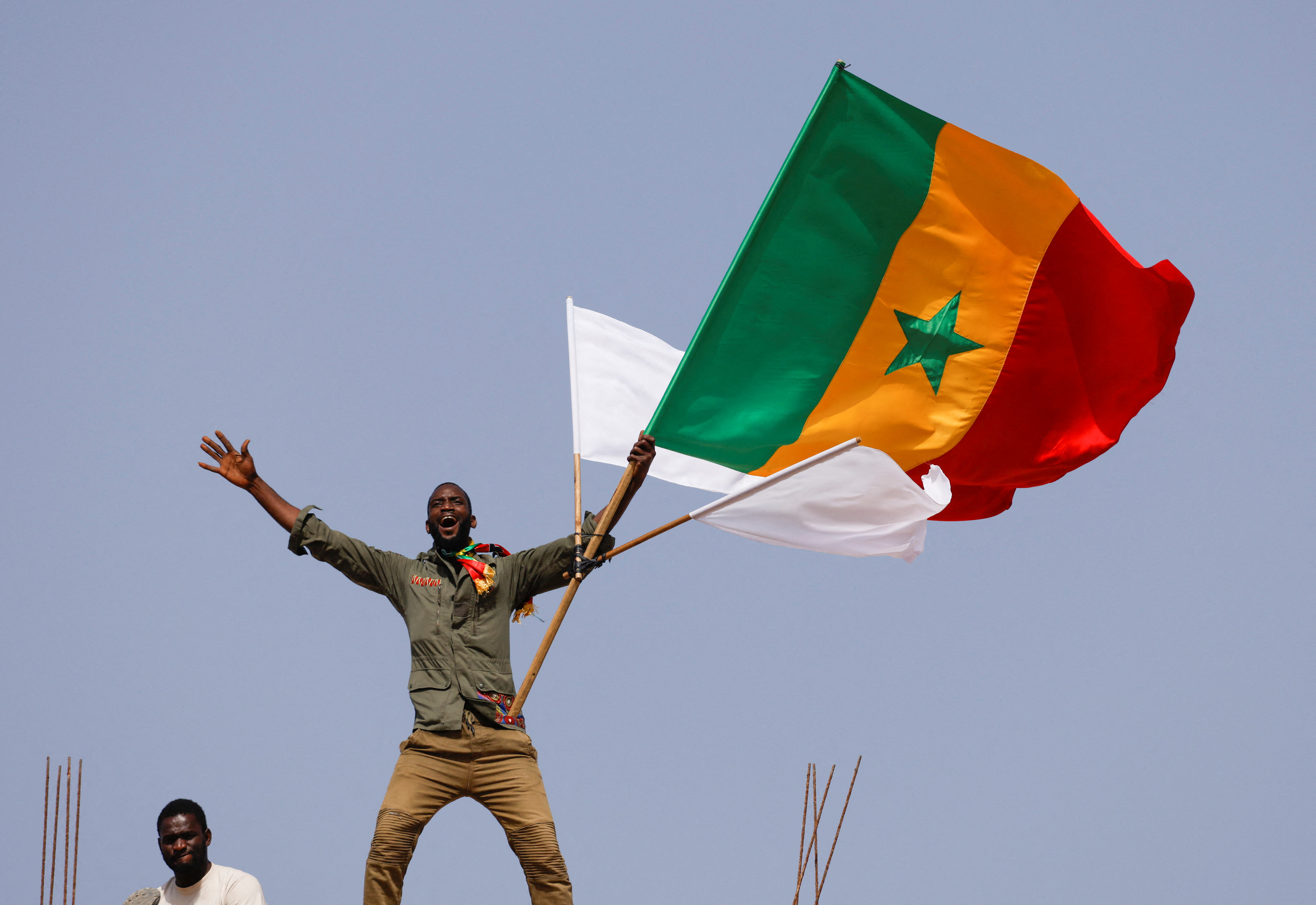 A supporter of Senegalese opposition leader Ousmane Sonko reacts during a protest to demand the release of alleged political prisoners in Dakar, Senegal March 14, 2023