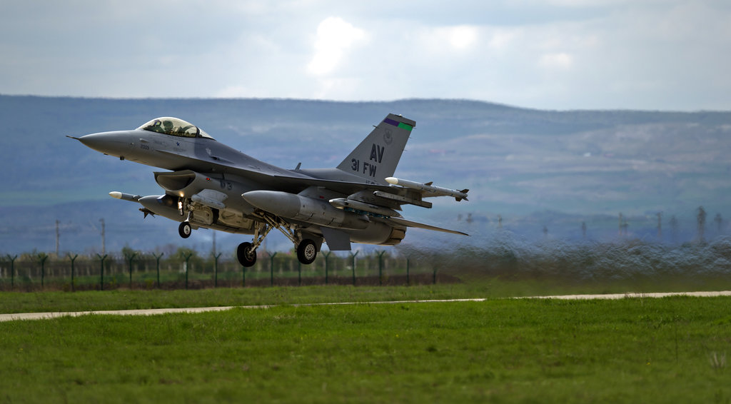FILE - In this Thursday, April 10, 2014 file photo, a U.S-made F16 fighter jet takes off from an air base in Campia Turzii, Romania. The Slovak government on Wednesday, July 11, 2018 has approved a Defense Ministry plan to purchase 14 F-16 military jets from the United States. The fighter jets are meant to replace the obsolete Soviet-made MiG-29 jets that the Slovak air forces have used. (AP Photo/Vadim Ghirda, file)
