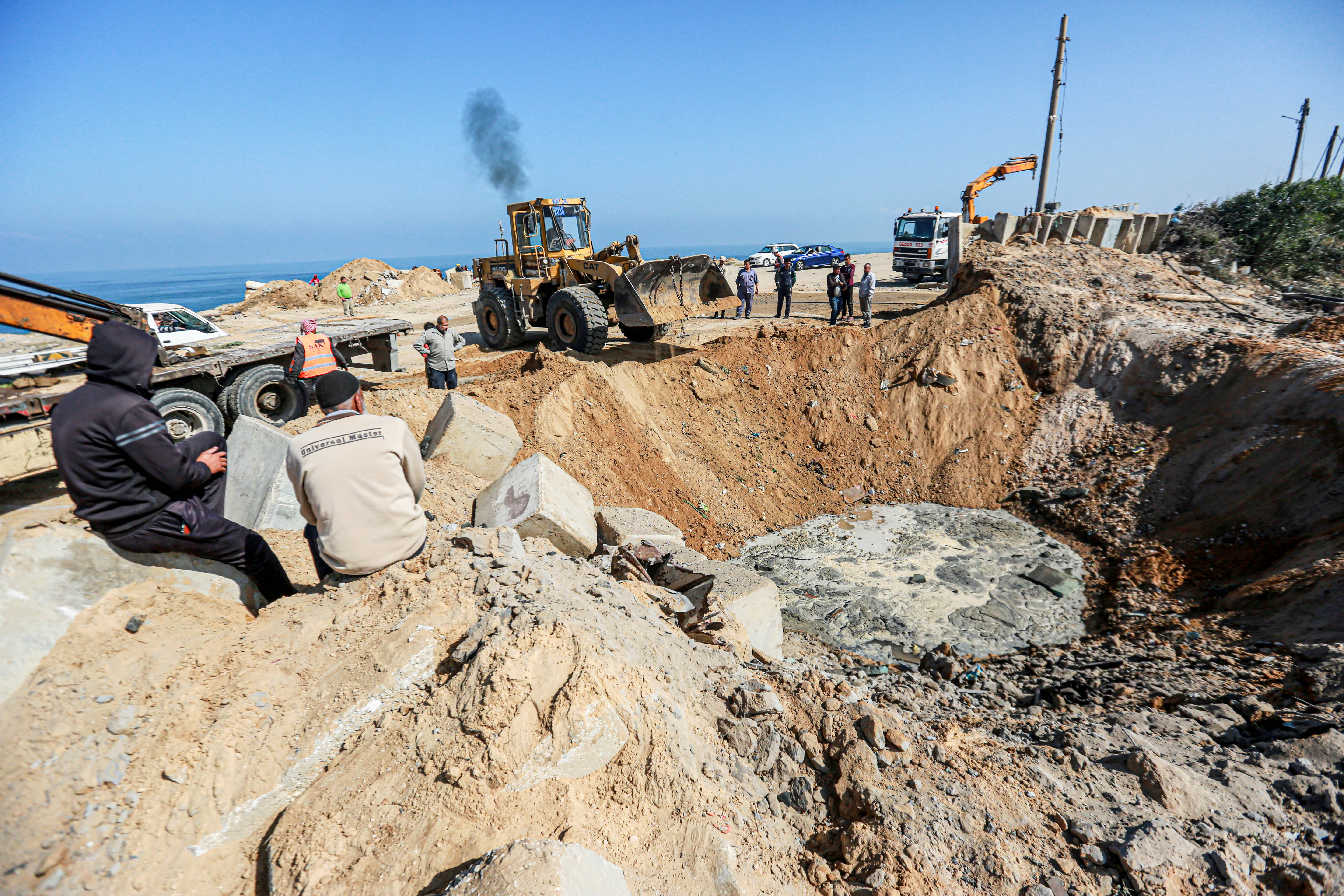 The Israeli bombing on an empty land in Deir al-Balah, central Gaza Strip last night-1683179269