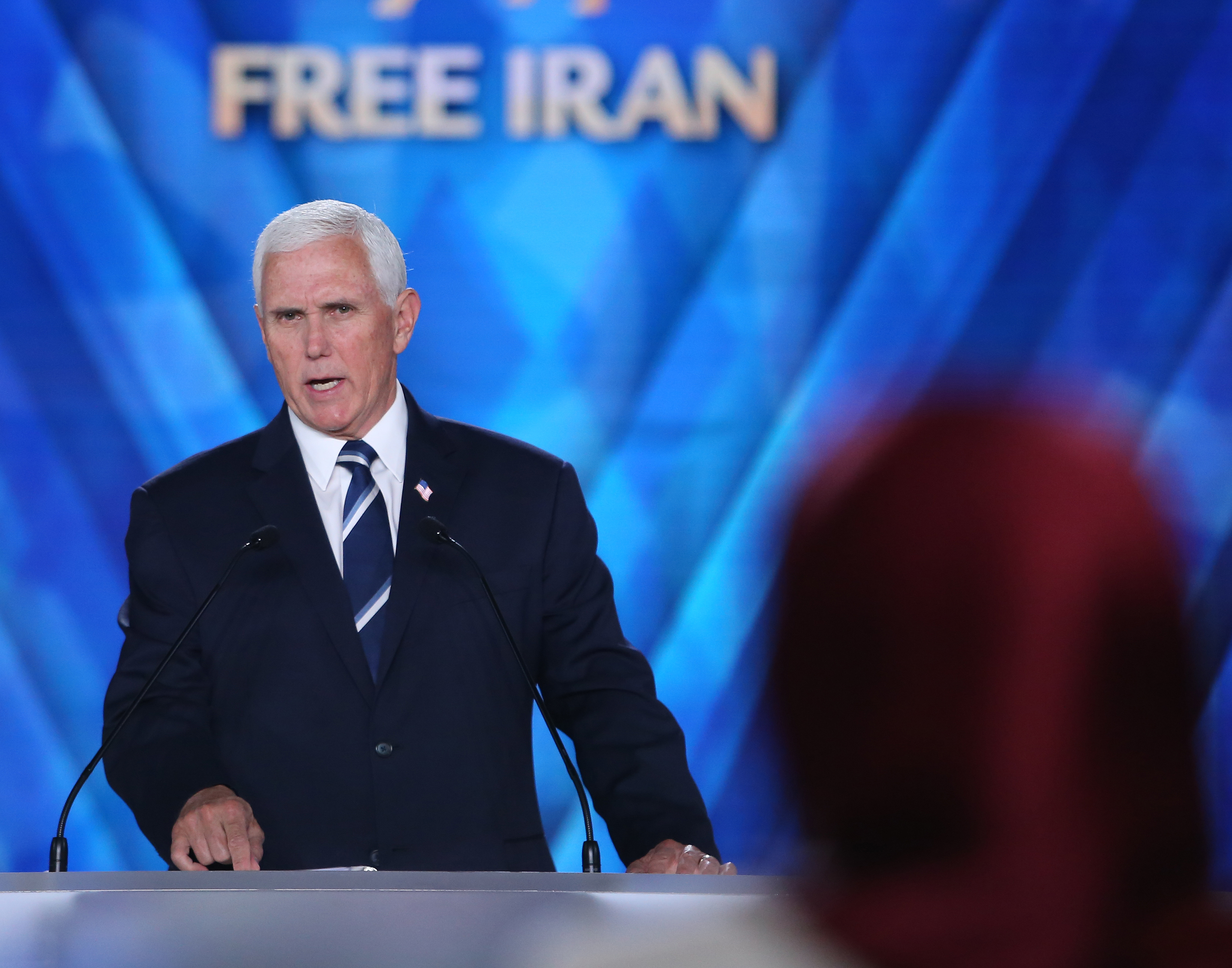 Former Vice President of the United States Mike Pence addresses a speech to the People's Mojahedin Organization of Iran