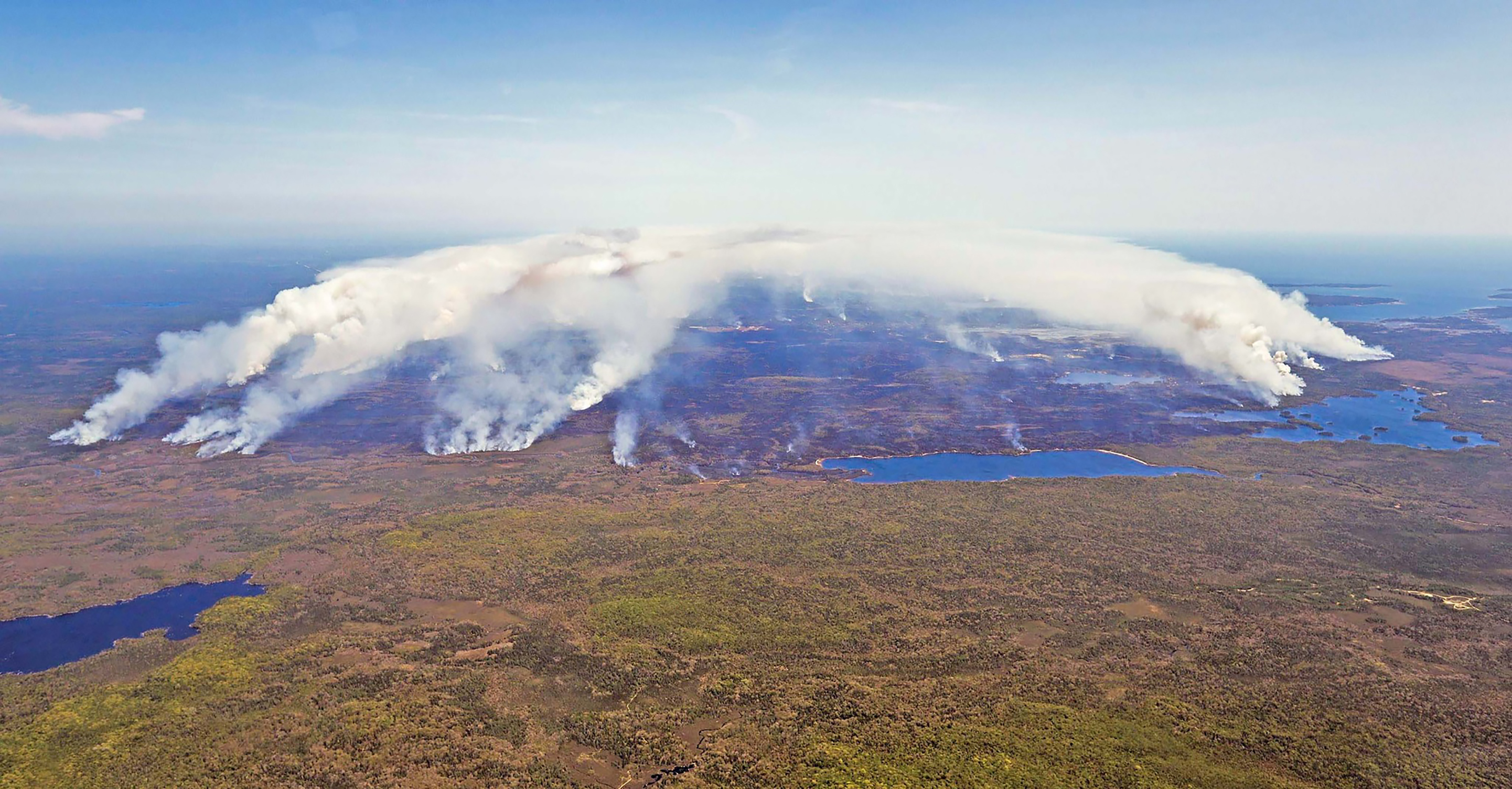 This May 31, 2023, aerial image courtesy of the Nova Scotia Government in Canada, shows the magnitude of the fire in Shelburne County.