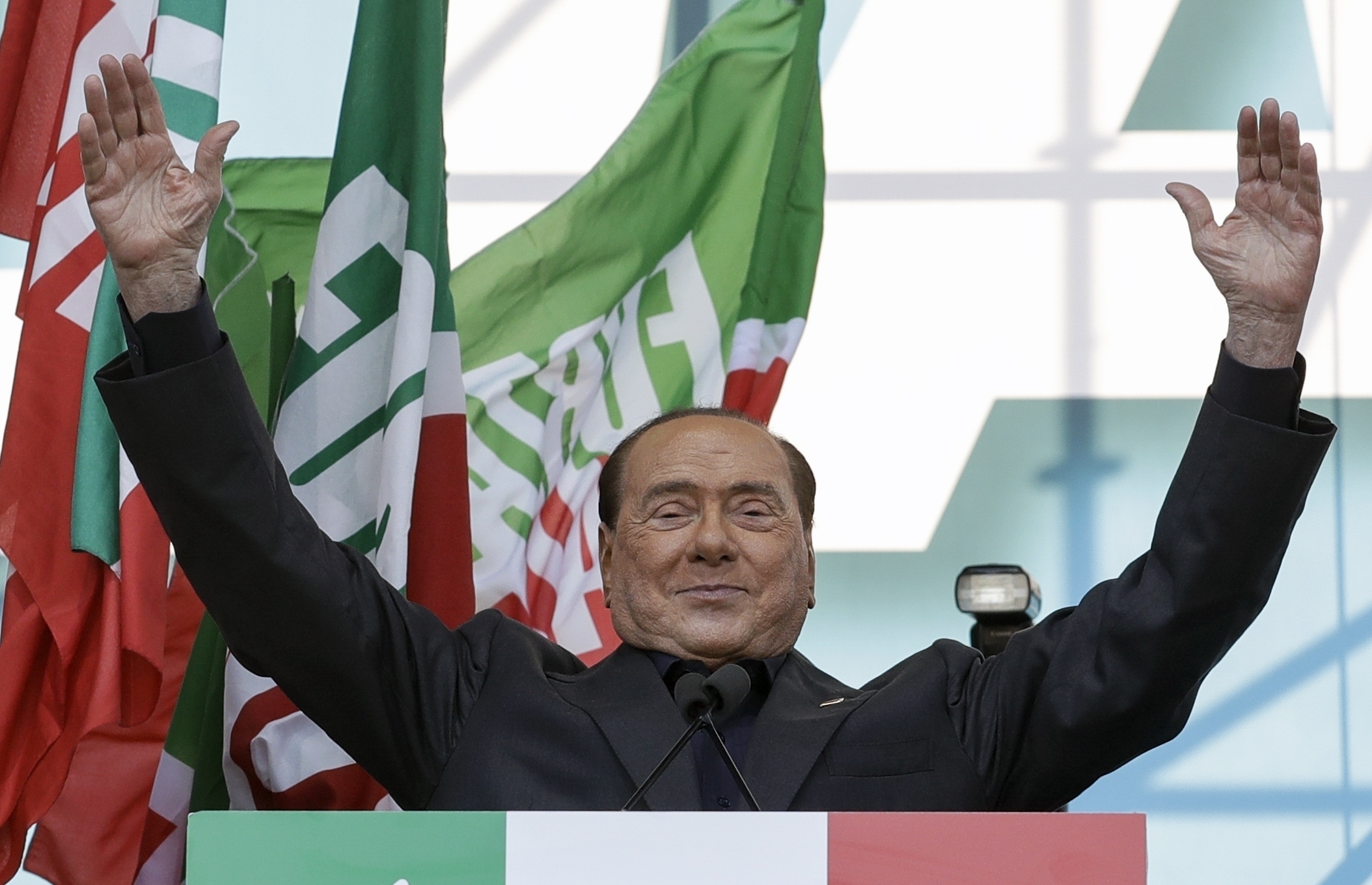 FILE - Silvio Berlusconi addresses a rally in Rome, on Oct. 19, 2019. Berlusconi, the boastful billionaire media mogul who was Italy's longest-serving premier despite scandals over his sex-fueled parties and allegations of corruption, died, according to Italian media. He was 86. (AP Photo/Andrew Medichini, File)