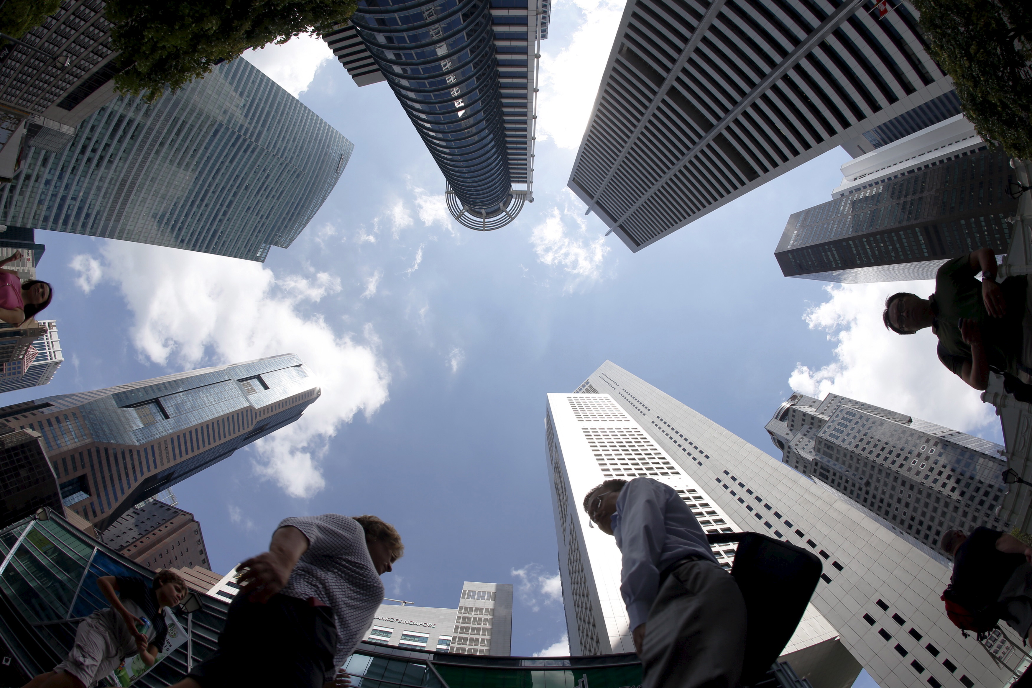 A view of the sky through high rise buildings in Singapore's central business district