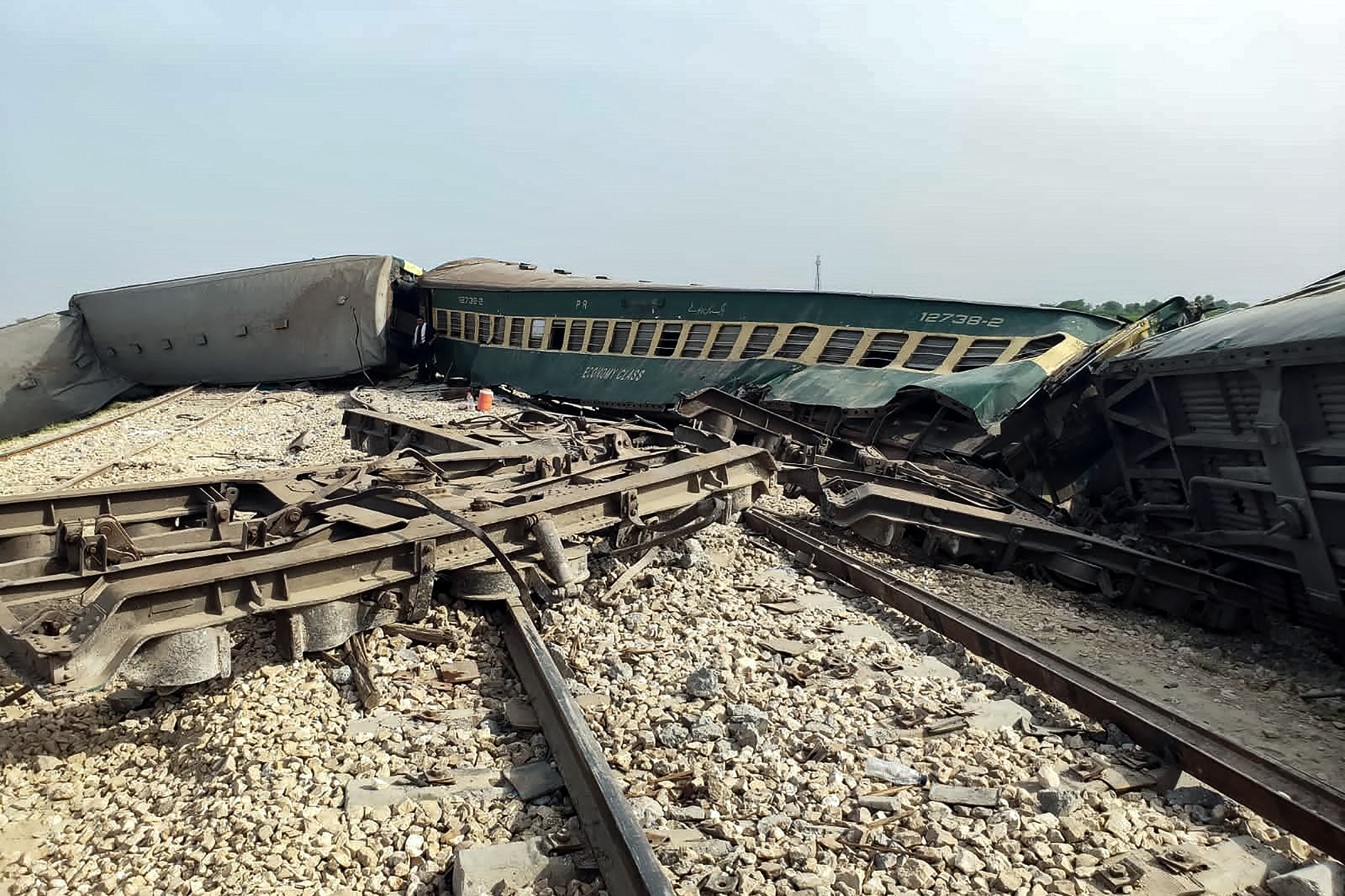 Damaged carriages are pictured following the derailment