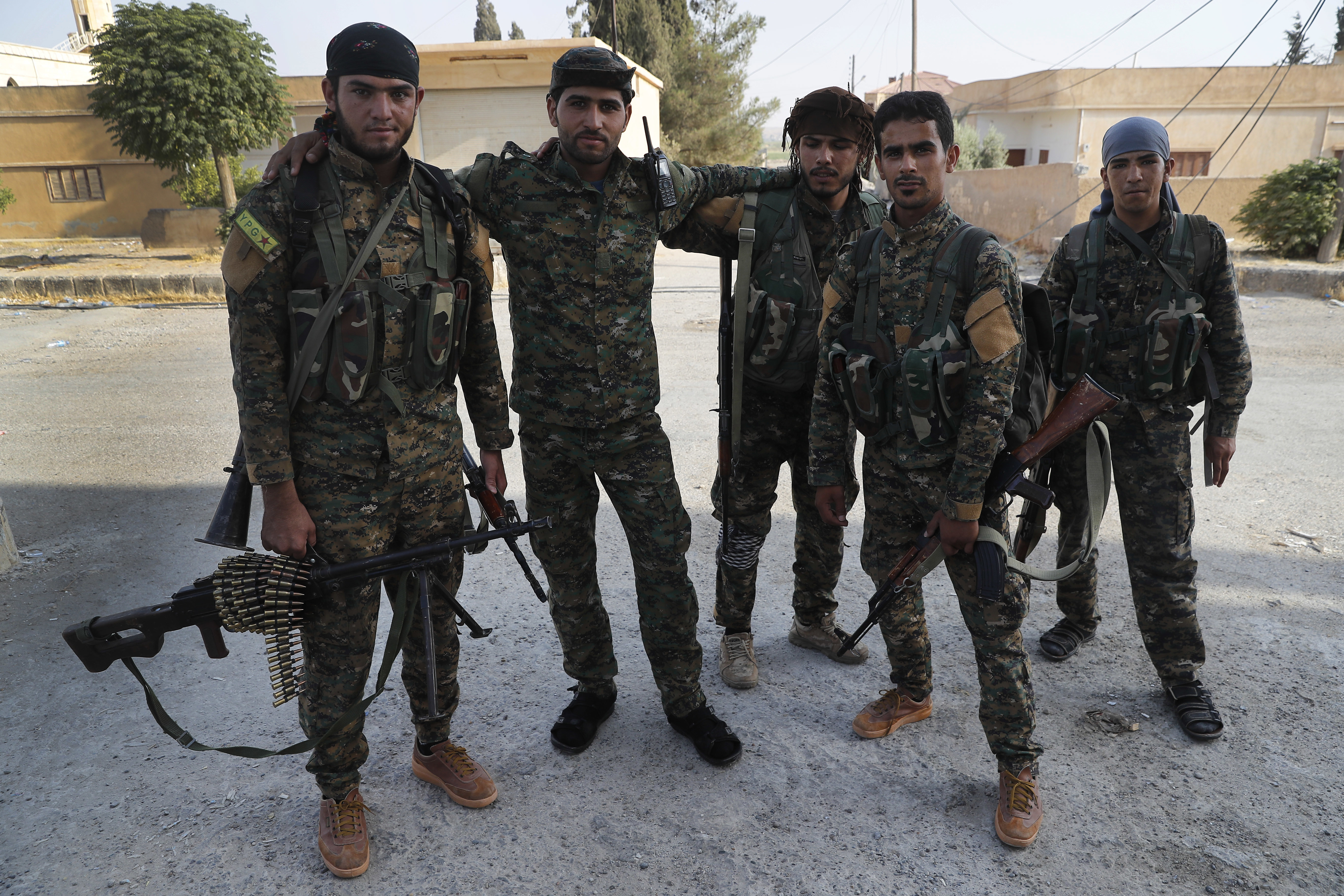Arab and Kurdish fighters with the U.S.-backed Syrian Democratic Forces (SDF)