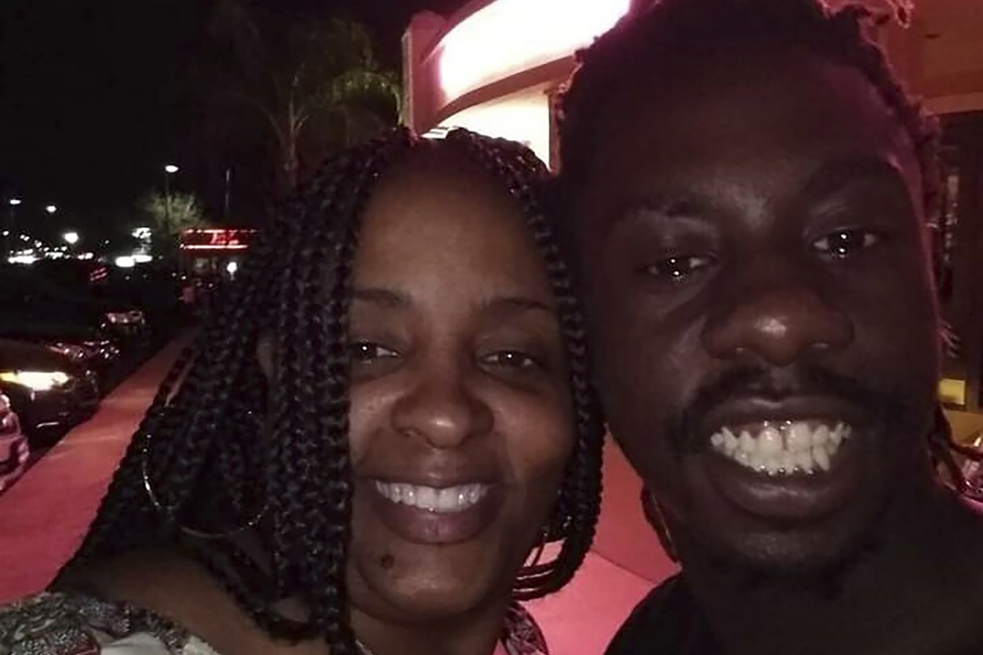 Jerrald Gallion (right), pictured with a friend Sabrina Rozier. He is smailing and looks very happy