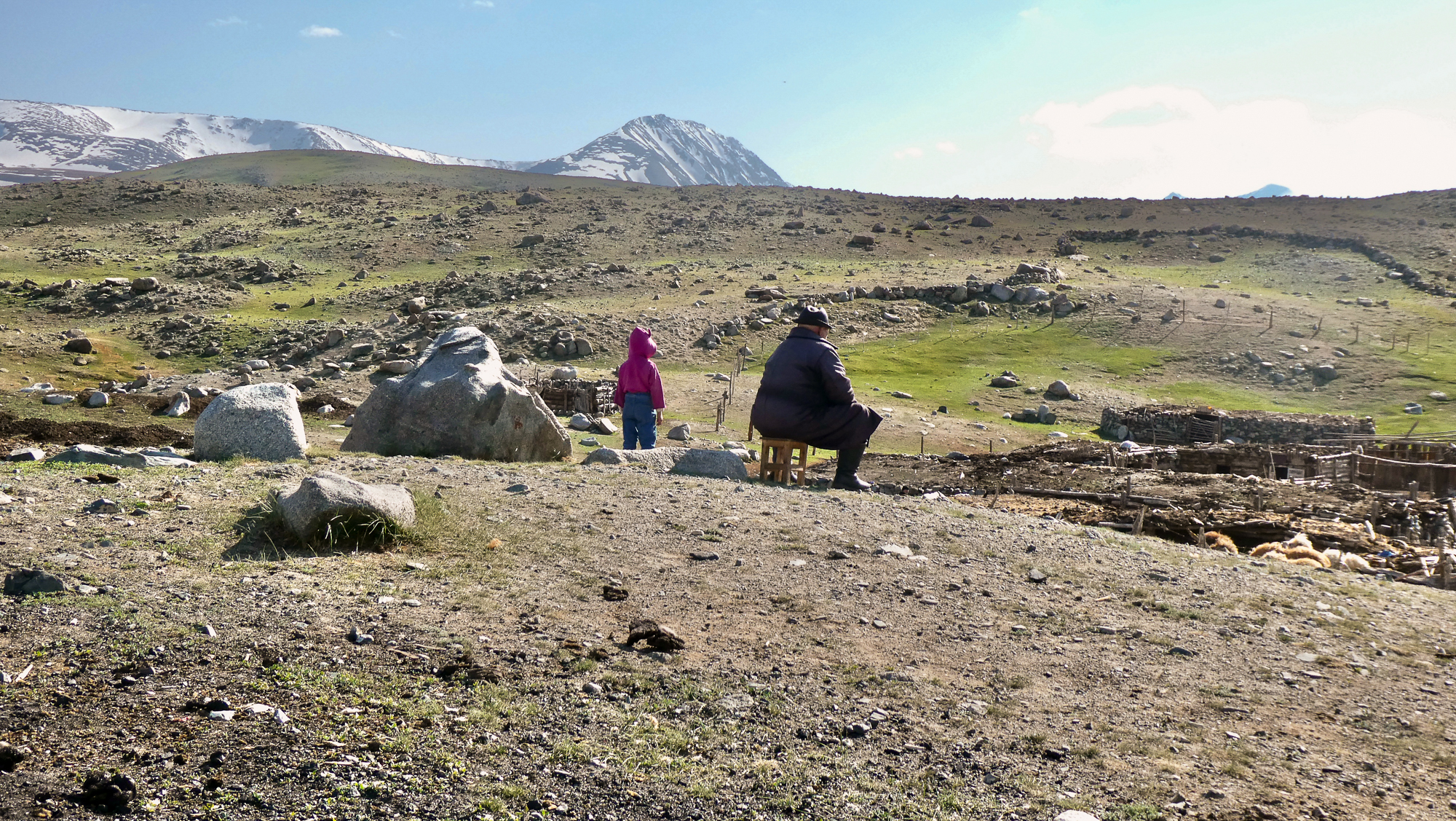 A man and his young granddaughter in Mongolia