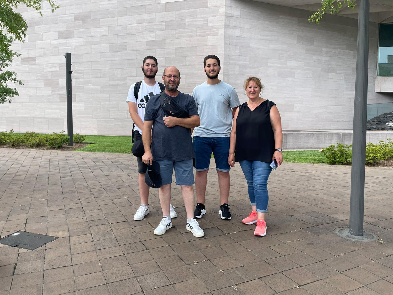 French tourist Carlos Nassar (in dark blue shirt), with family visiting Washington, DC, August 3, 2023