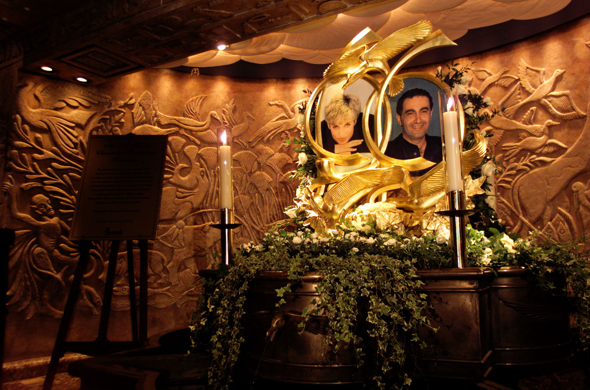 A bronze fountain memorial to Dodi Al Fayed and Diana, Princess of Wales, sits in Harrods department store after it was unveiled in central London August 31. The memorial was unveiled a year to the day when Diana and Dodi were tragically killed in a high speed crash in Paris. DJM/JDP