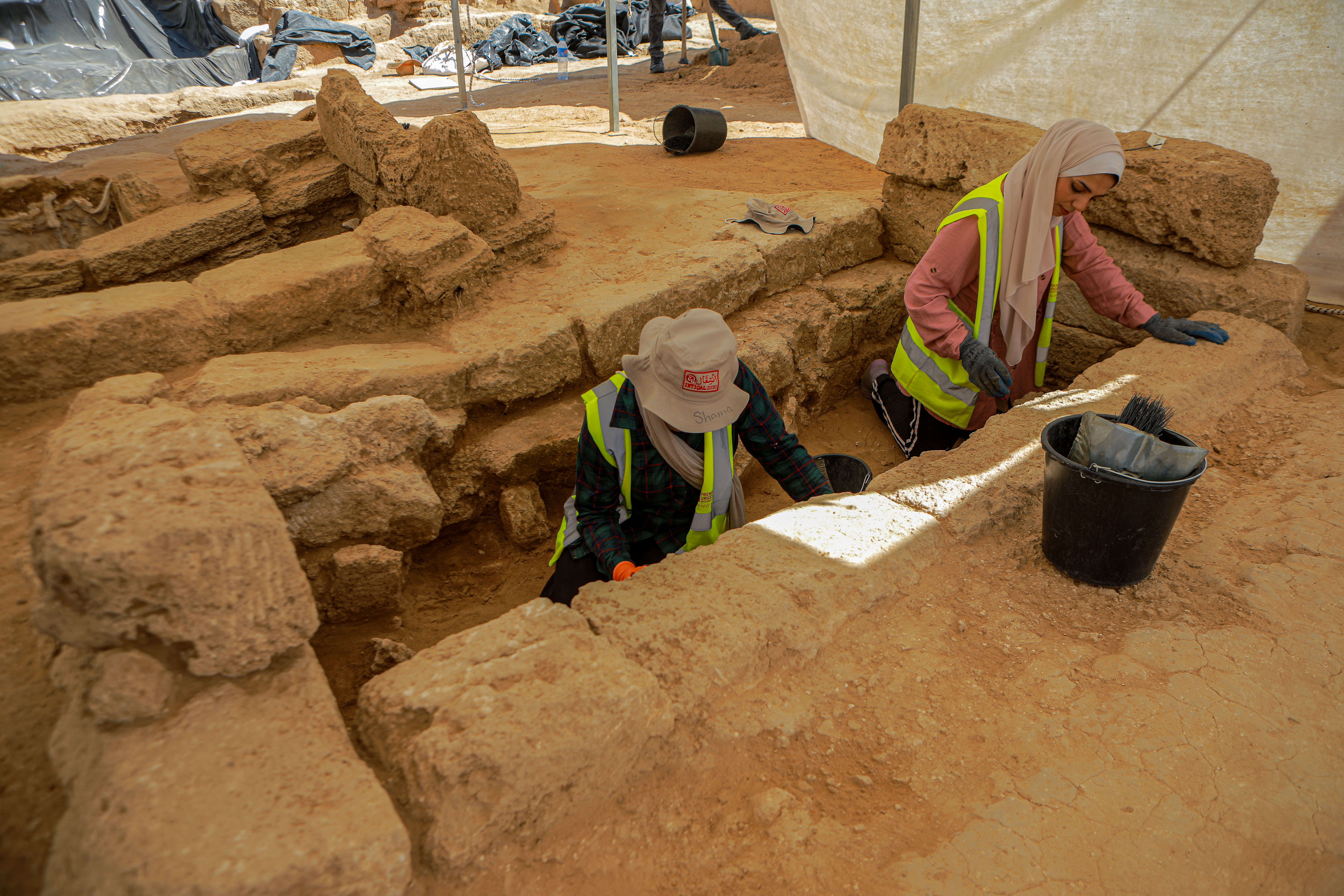 girls working in cemetery site
