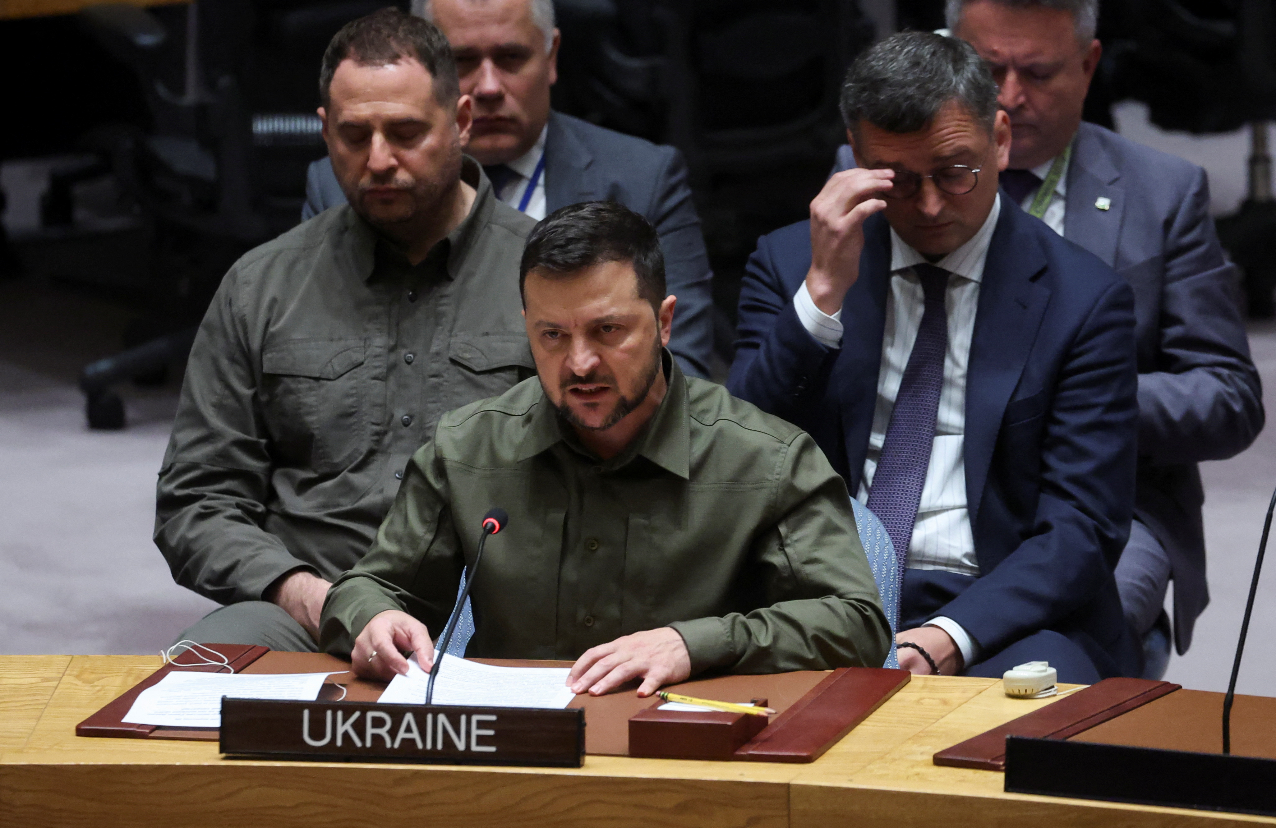 Ukraine's President Volodymyr Zelenskyy looks across the room towards Russia's Ambassador to the United Nations Vasily Nebenzya as Zelenskyy addresses the United Nations Security Council during a ministerial level meeting of the Security Council on the crisis in Ukraine at U.N. headquarters in New York, September 20, 2023.