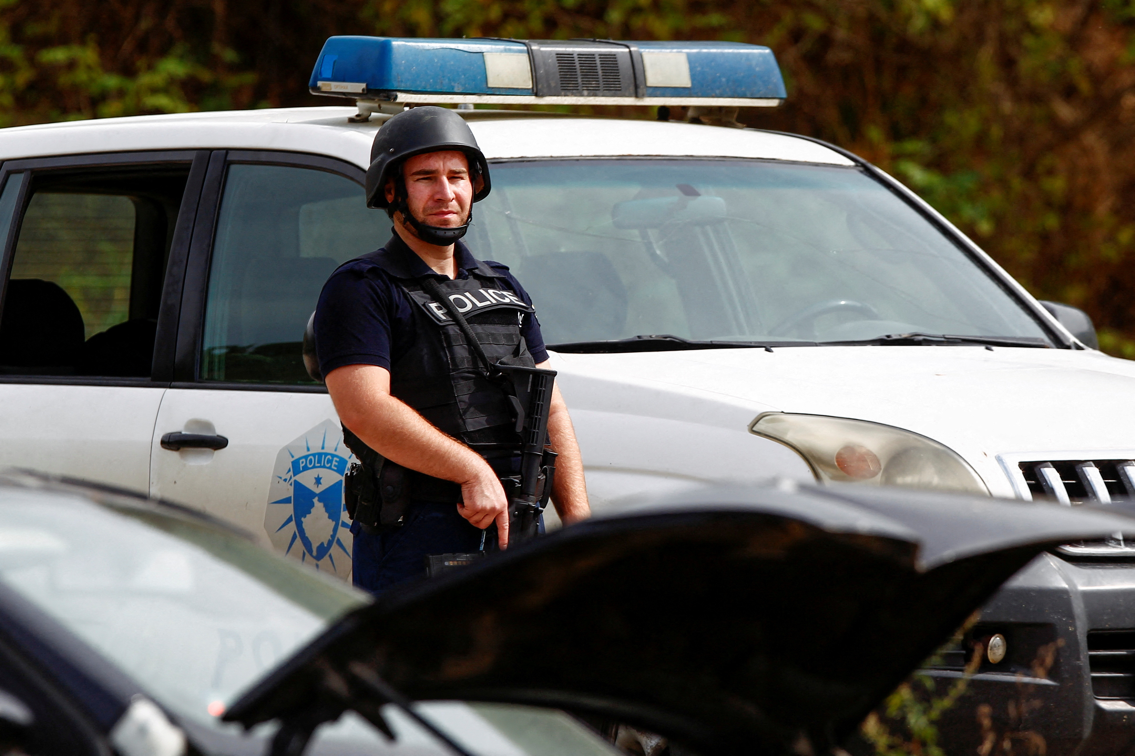 Police officer stands guard
