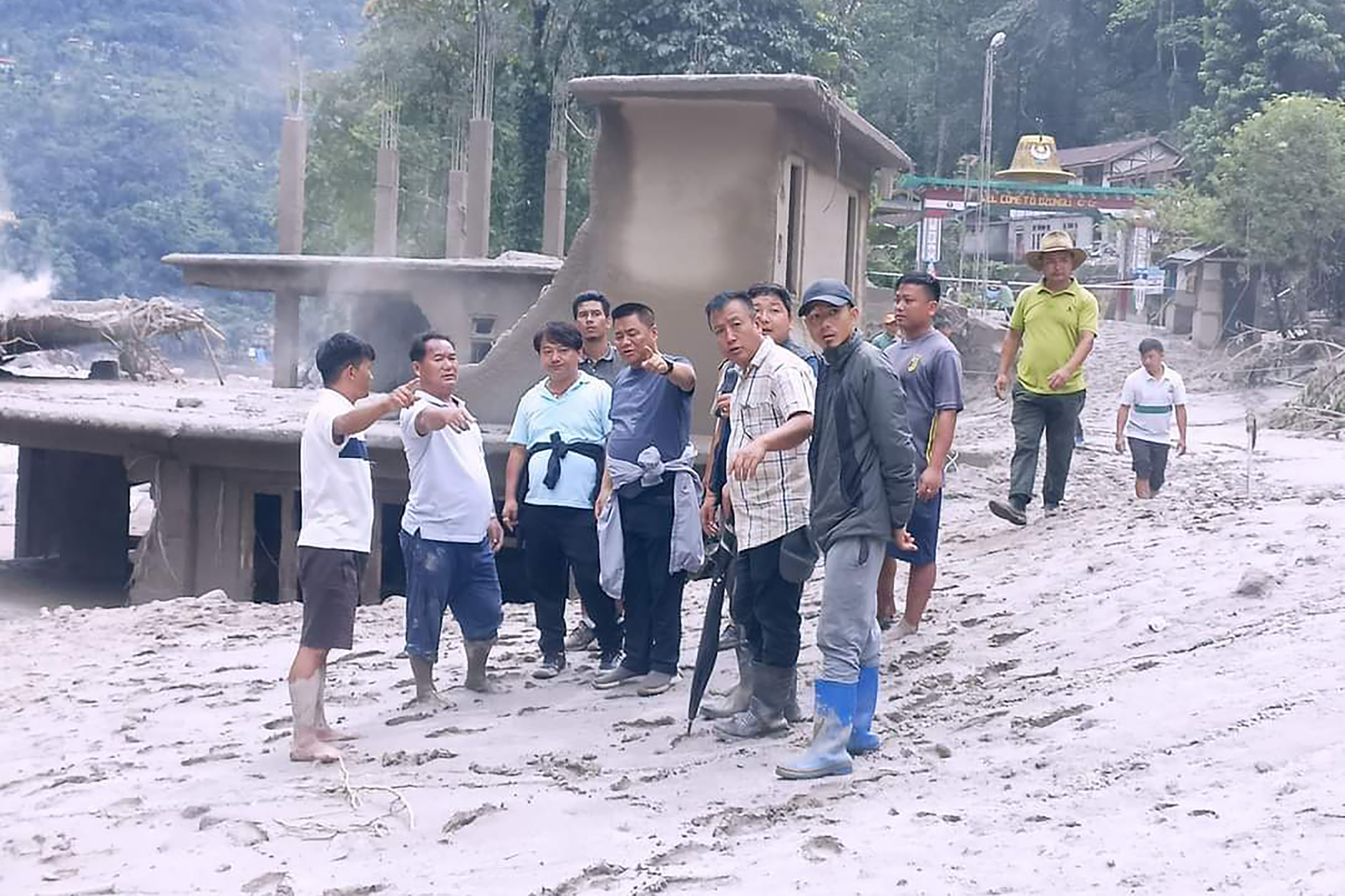 Locals assess damage after flash floods