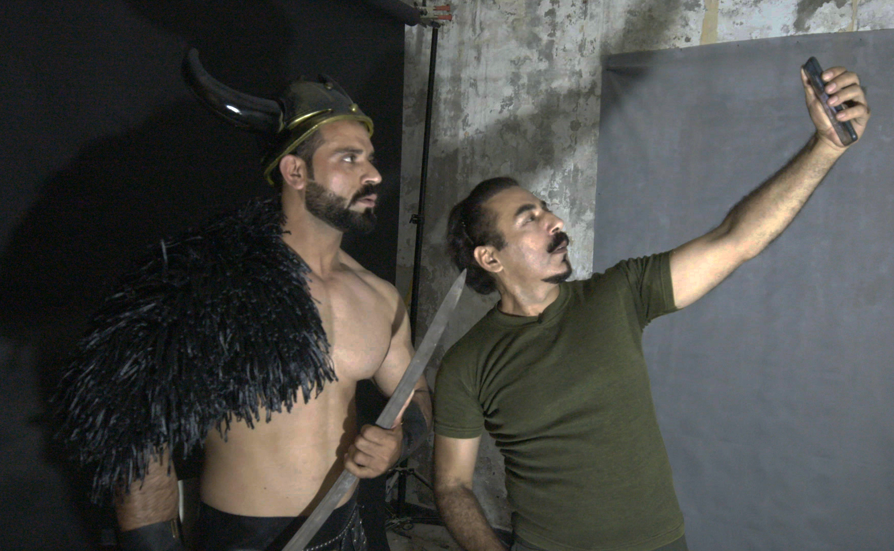 54. Kamran takes a BTS selfie with Zishan to pose on his Instagram